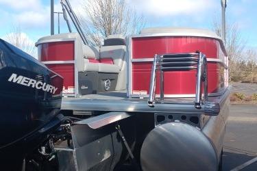2026 Sun Tracker Party Barge 22 XP3 with Mercury engine, rear view.