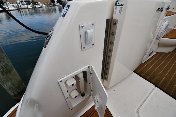2003 Sea Ray 460 Sundancer yacht deck with open utility panel.