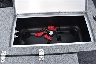 2026 Lowe Fishing Machine 1675 WT livewell with red accessories inside.