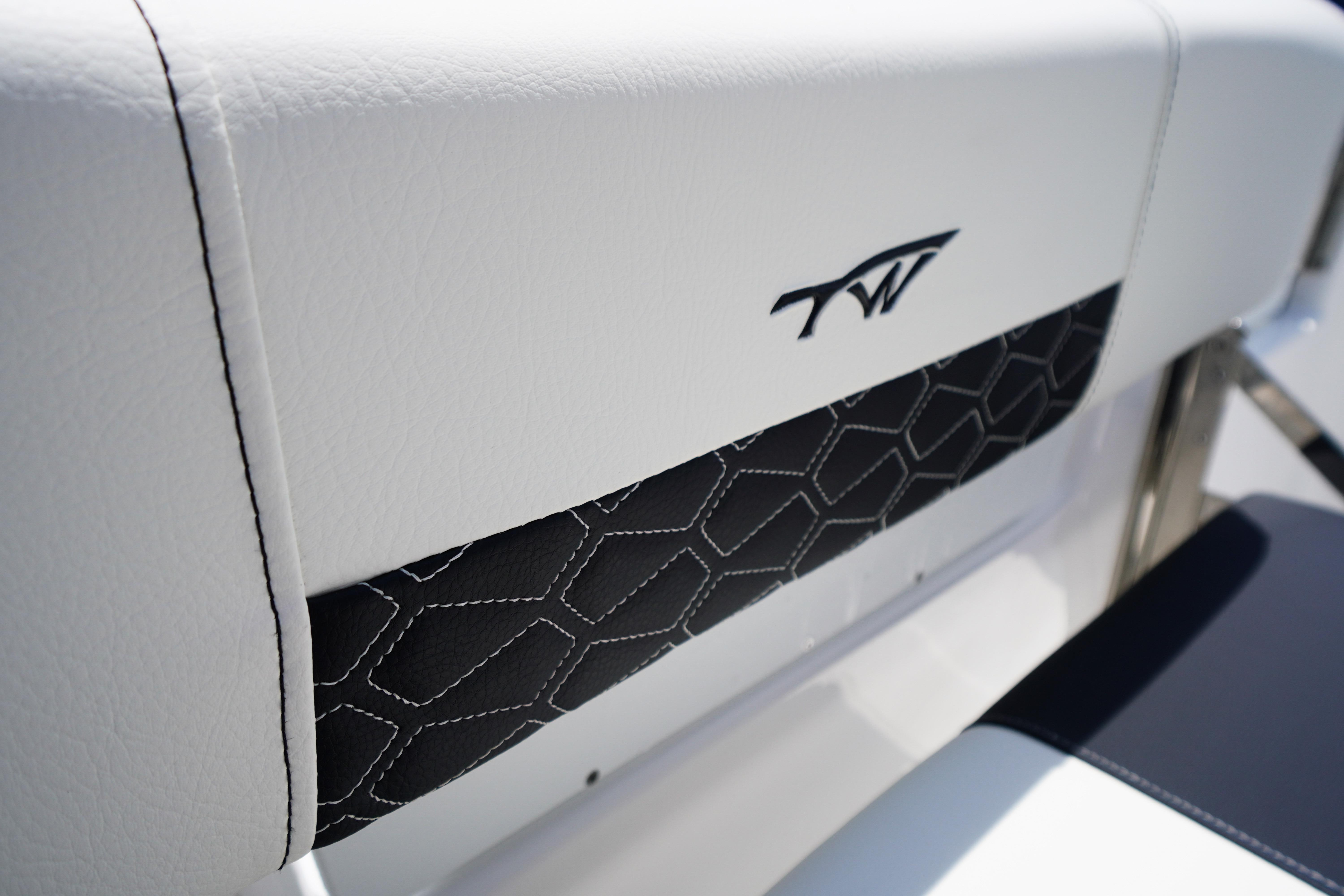2027 Tidewater 220 CC Adventure boat seat with stylish stitching and logo detail.