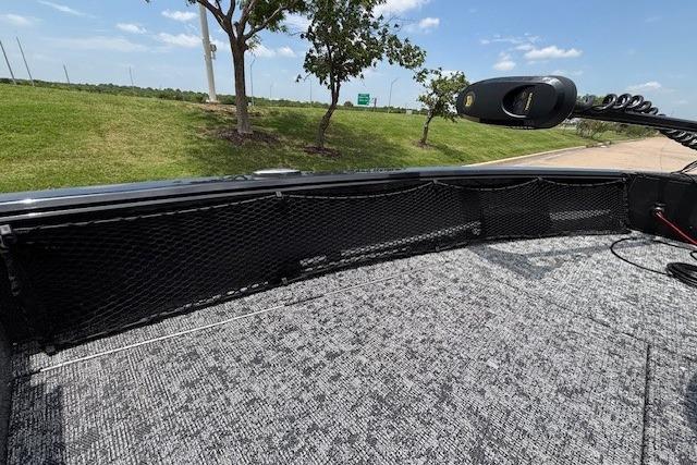 2026 Ranger VS1782SC Angler boat interior with storage netting and carpeted flooring.