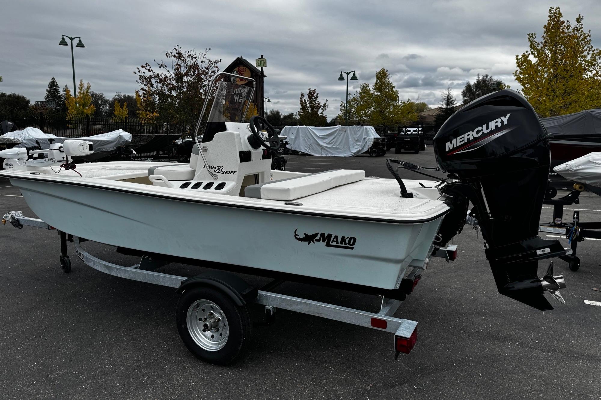 2026 Mako Pro Skiff 13 CC boat with Mercury engine on trailer.