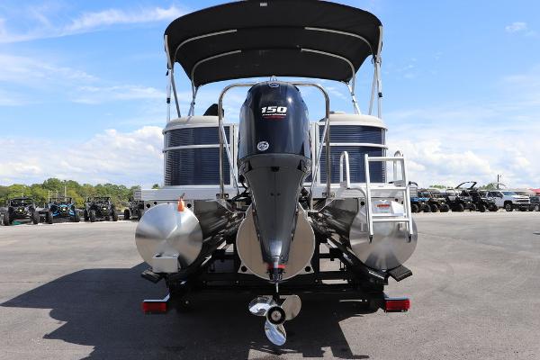 2024 Bennington 21 SSR pontoon boat with 150 HP engine, rear view.