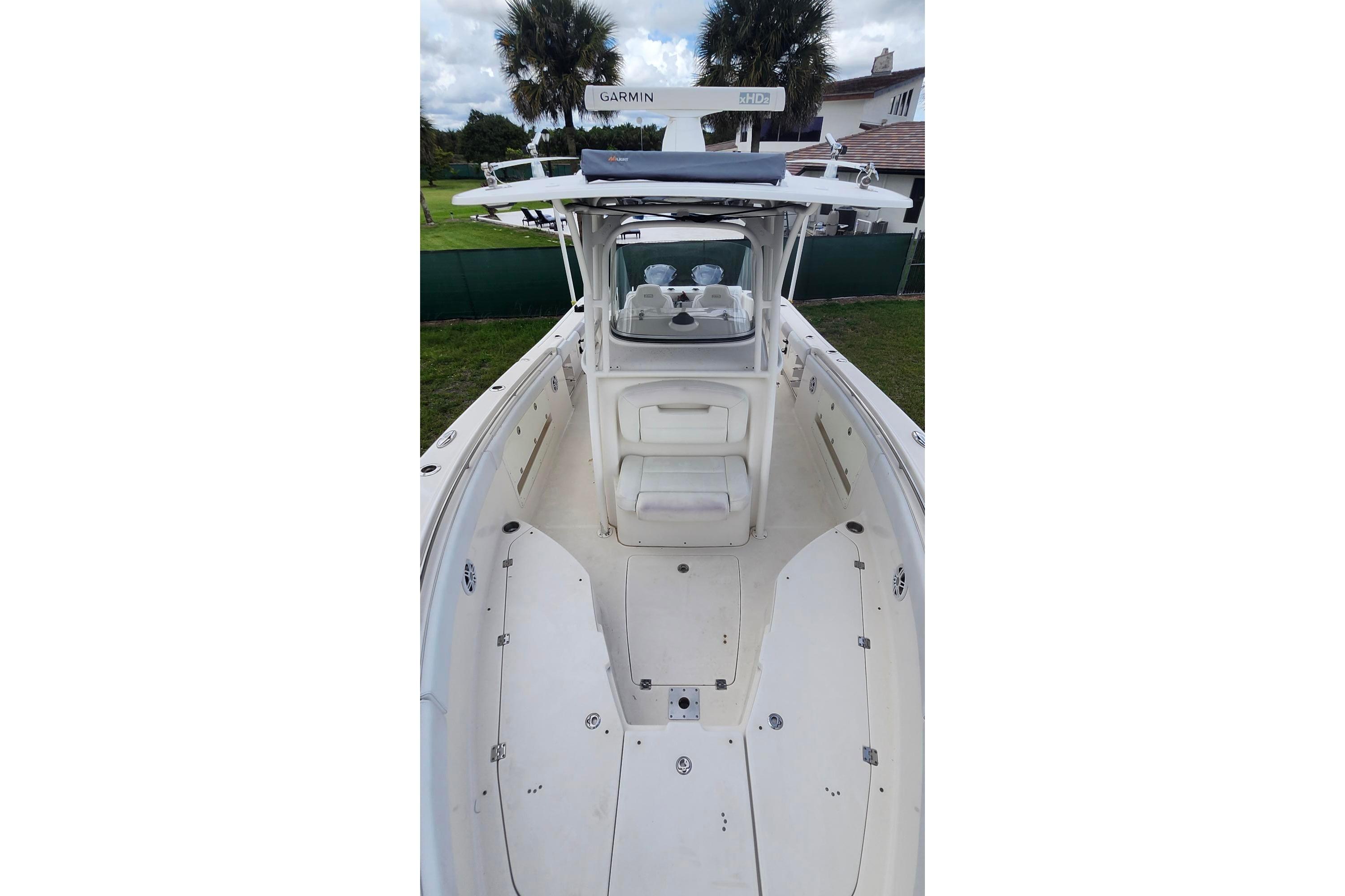 2015 Robalo R300 Center Console boat with spacious deck and modern console.