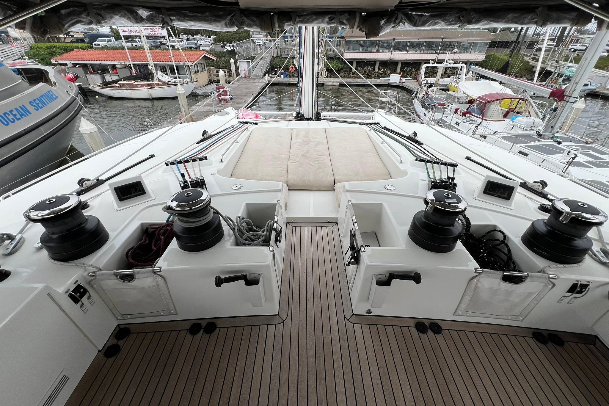 Cockpit view of 2019 Lagoon 620 yacht docked at marina.