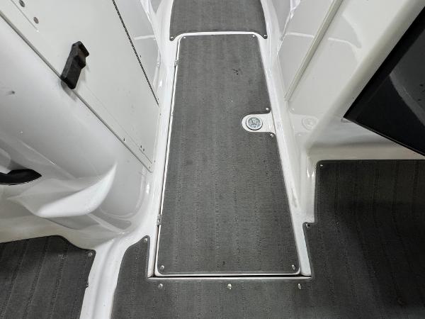 Yamaha Boats 212X 2014 interior flooring with gray carpet and white trim.
