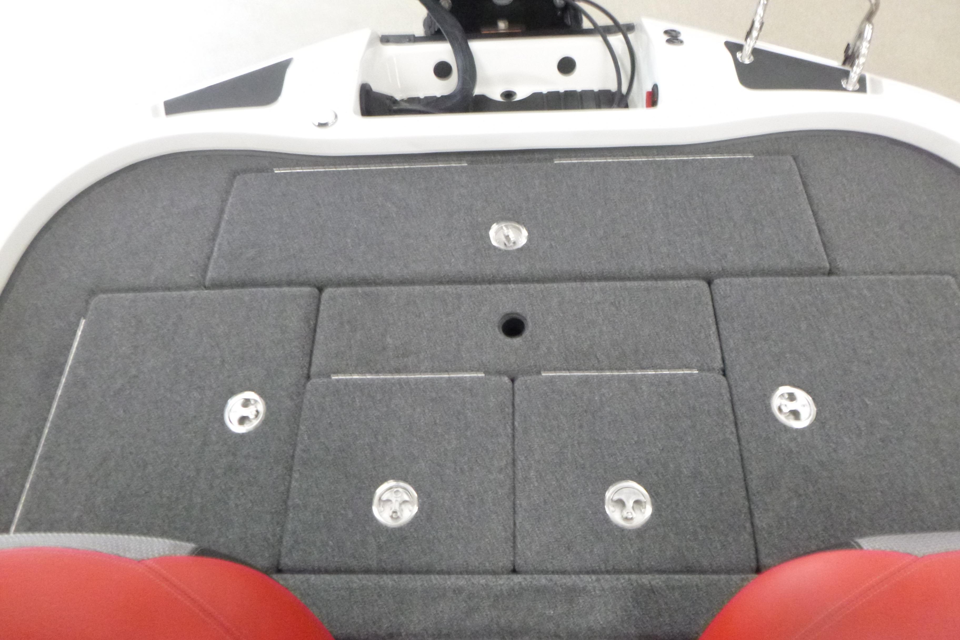 2025 Ranger Z185 boat deck with storage compartments and red seating.