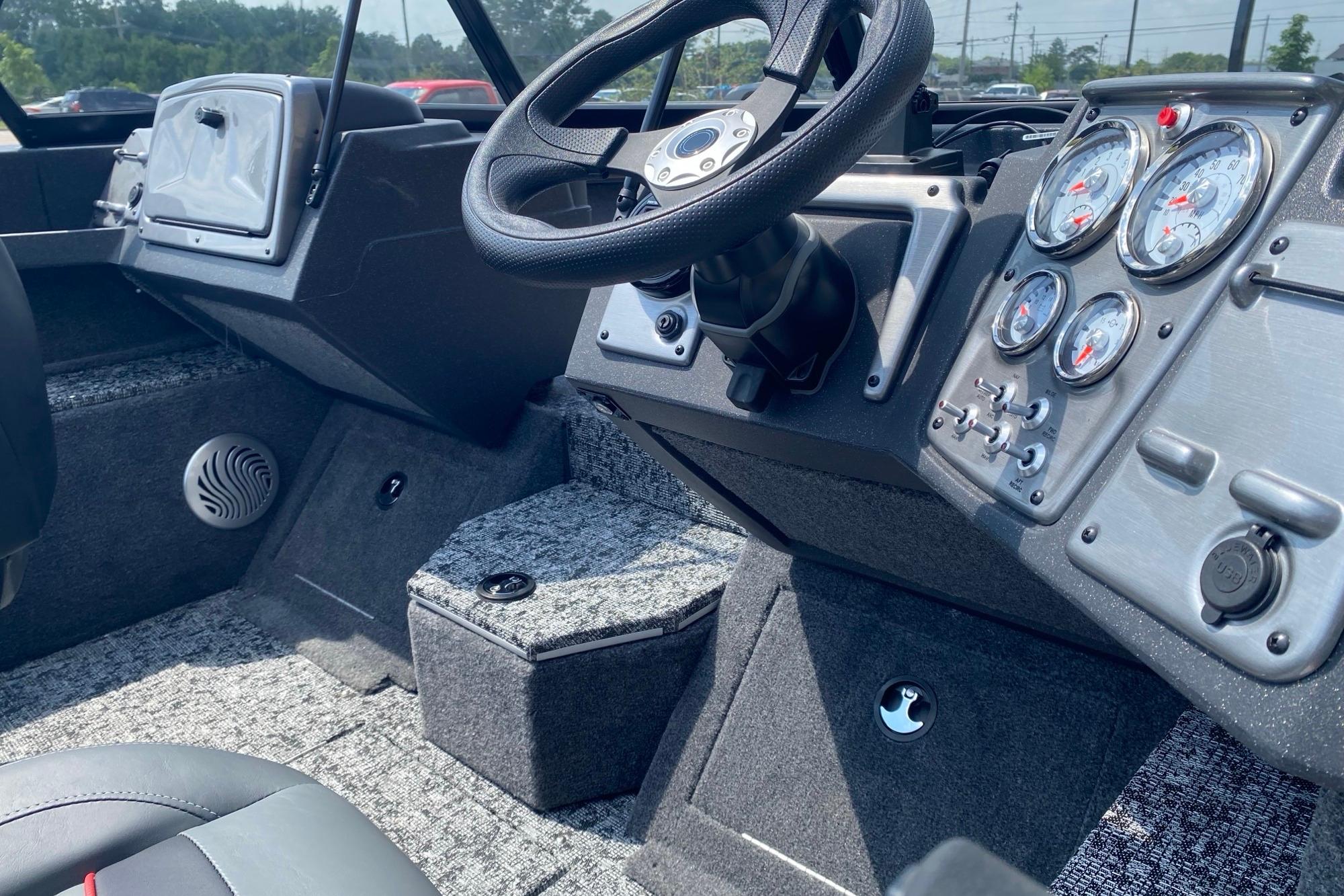 Interior view of 2026 Tracker Pro Guide V-175 Combo boat dashboard and controls.