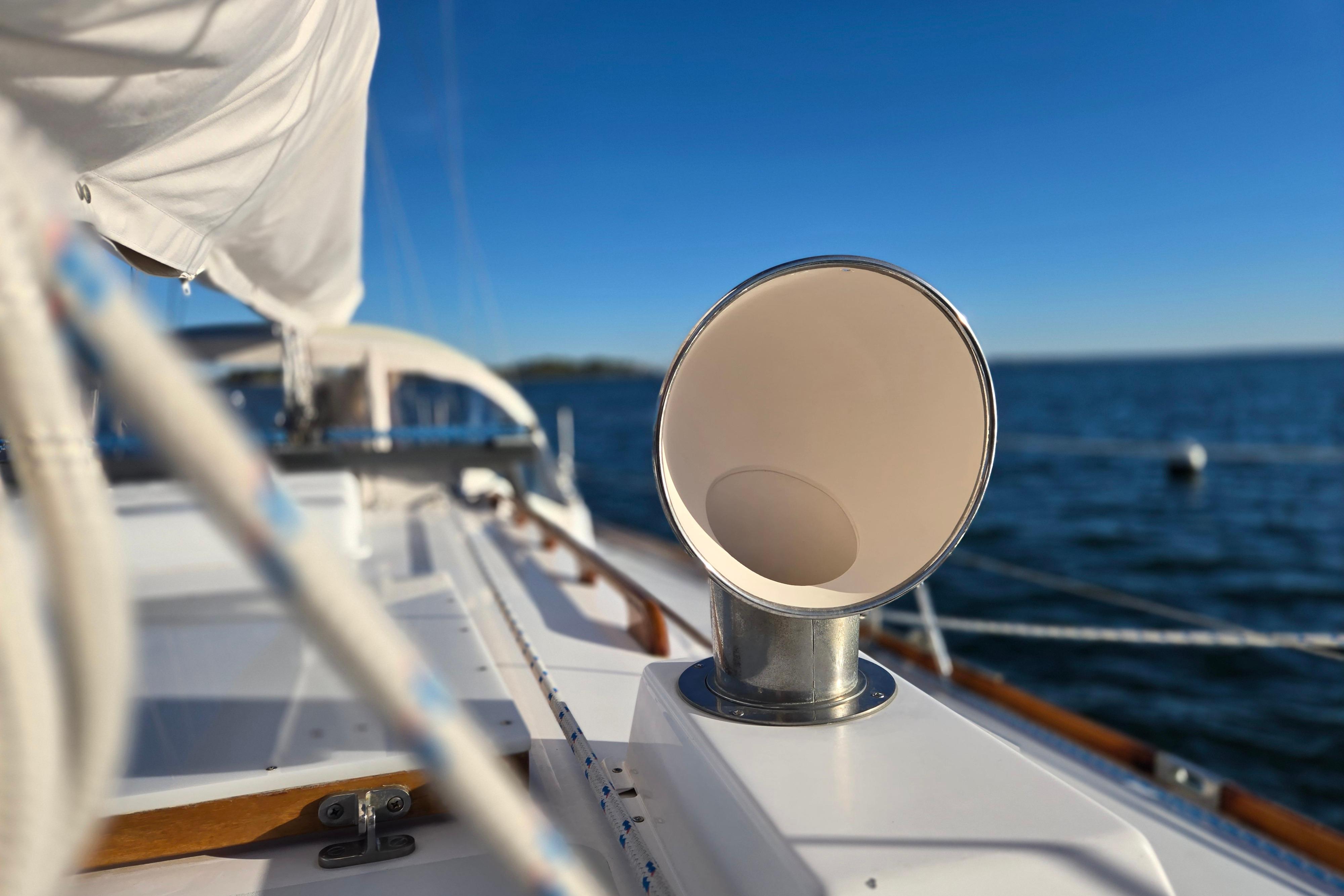 Hinckley Bermuda 40 sailboat deck with ocean view, featuring a chrome vent, 1970 model.