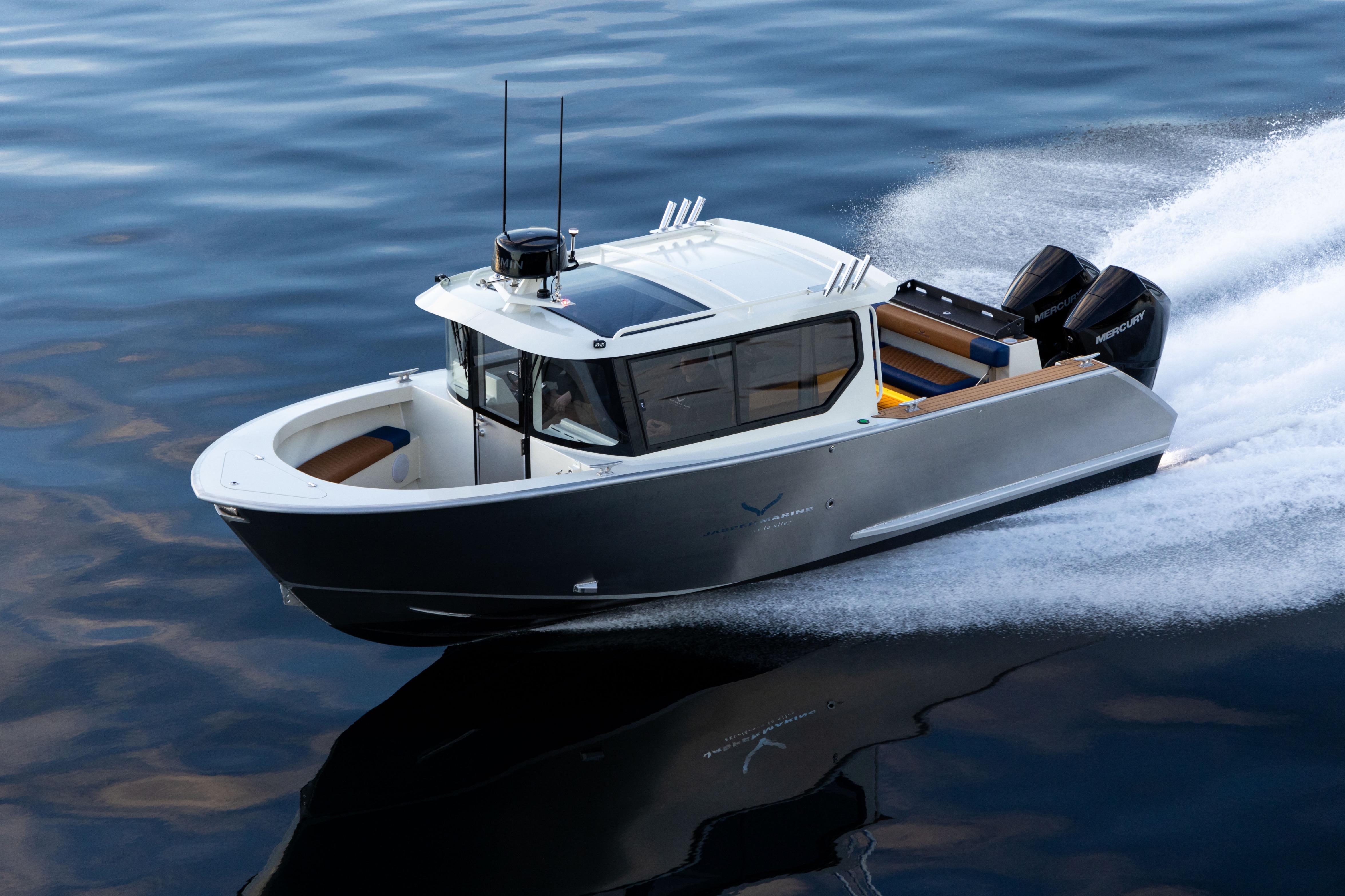 2026 Jasper Marine Defender 22 boat cruising on calm water, showcasing sleek design and powerful engines.