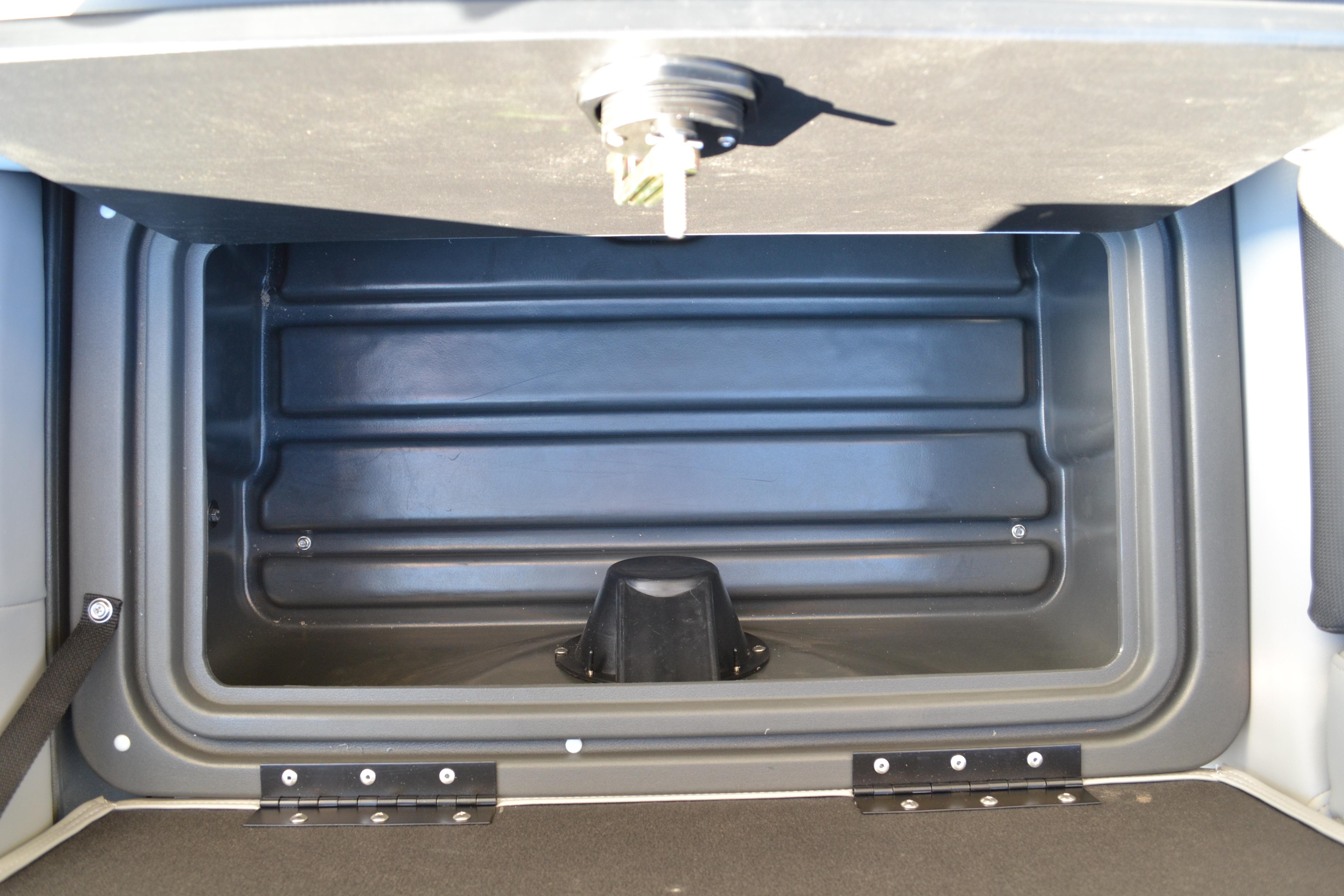 Storage compartment of 2026 Sun Tracker SportFish 22 XP3 boat.