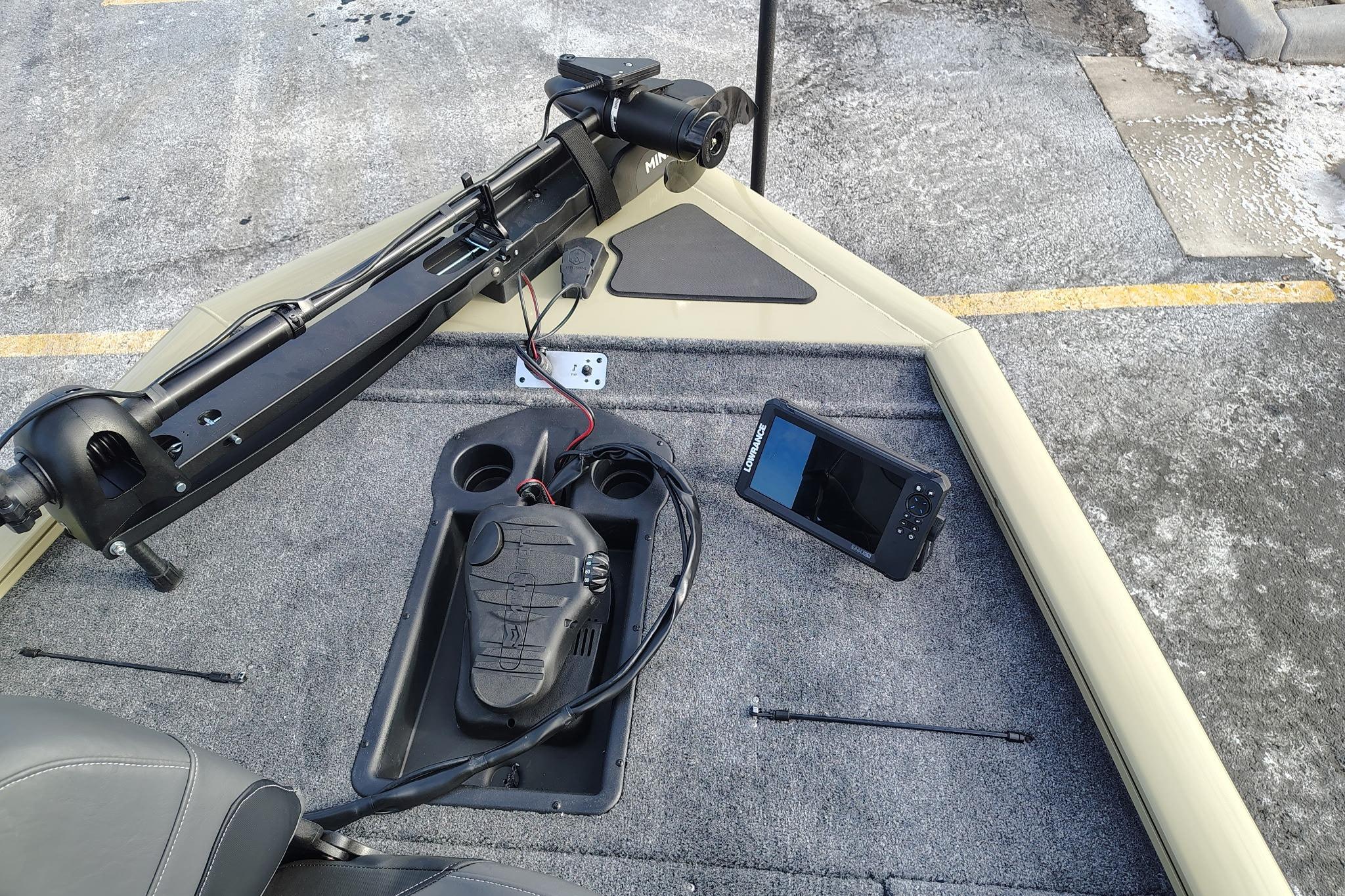2026 Tracker Pro Team 195 boat deck with trolling motor and fish finder.