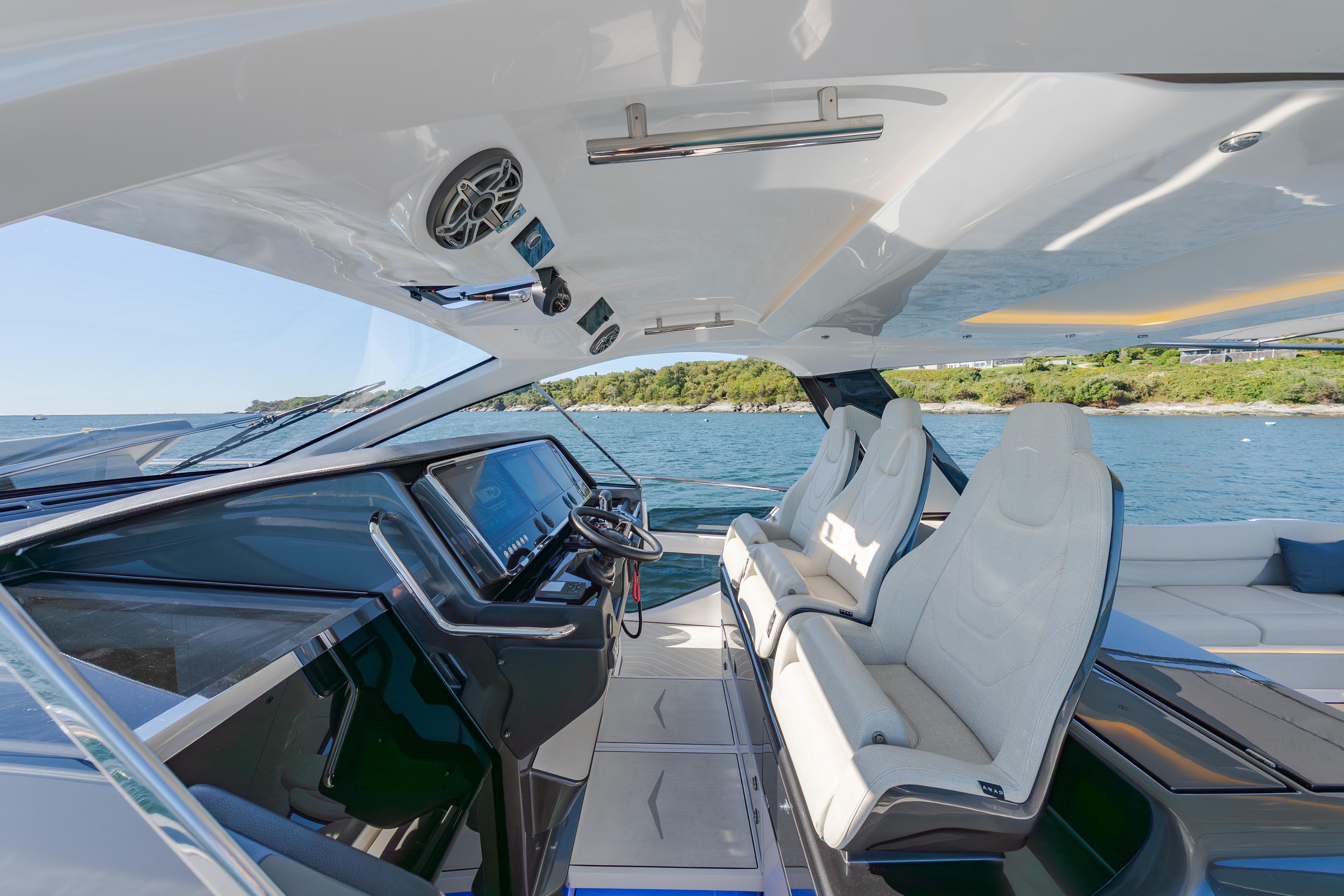 Luxurious interior of 2023 Azimut Verve 47 yacht with sleek design and modern controls.