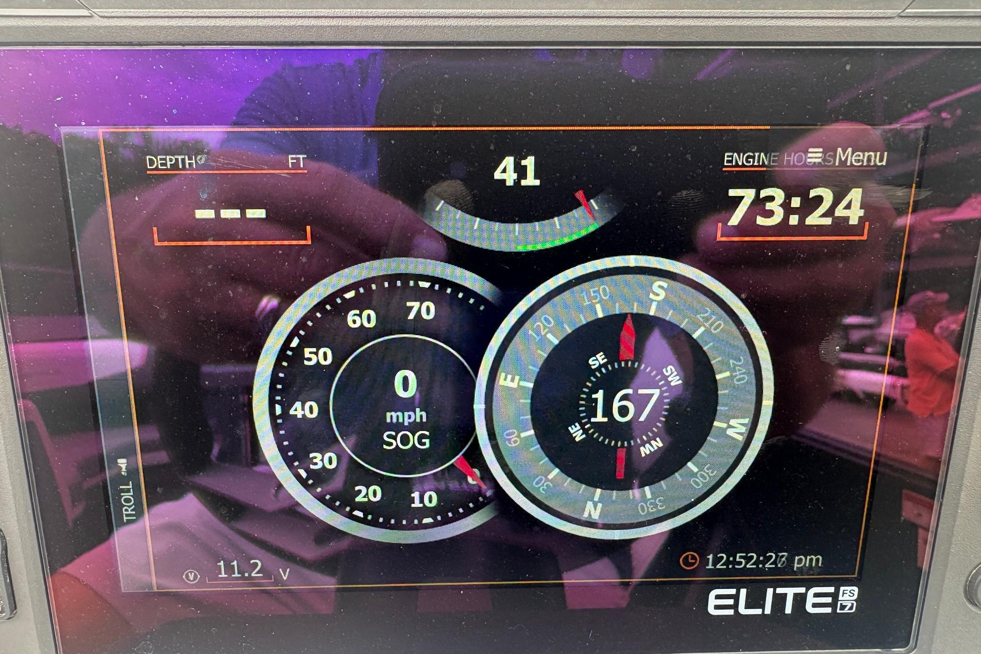 Digital dashboard of 2023 South Bay 525 RS 3.0 Arch boat displaying speed and navigation data.