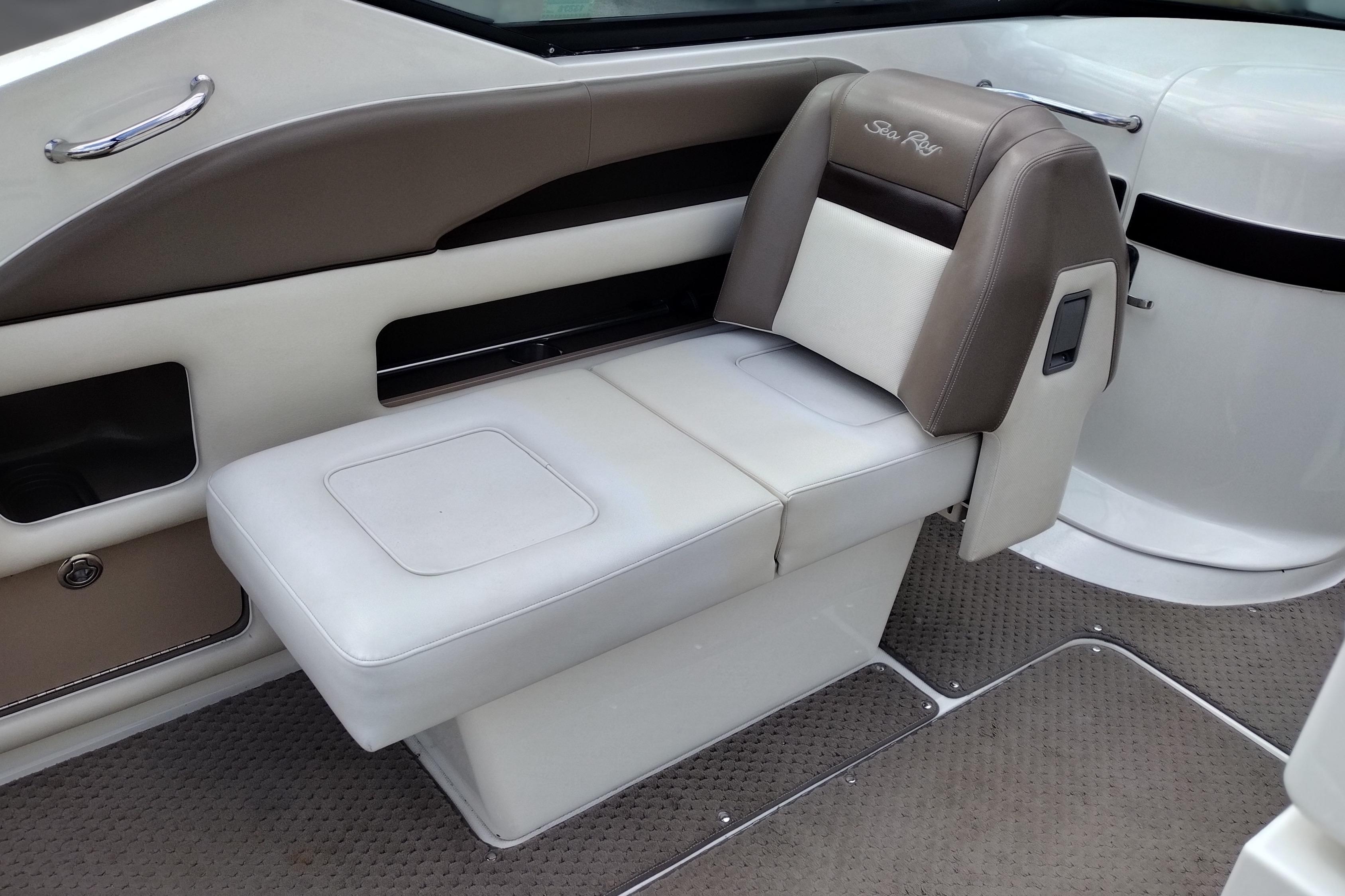 2013 Sea Ray 300 SLX boat interior with beige and brown seating.
