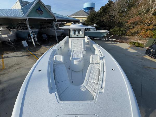 2025 Yellowfin 39 Offshore boat with spacious deck and seating, displayed outdoors.