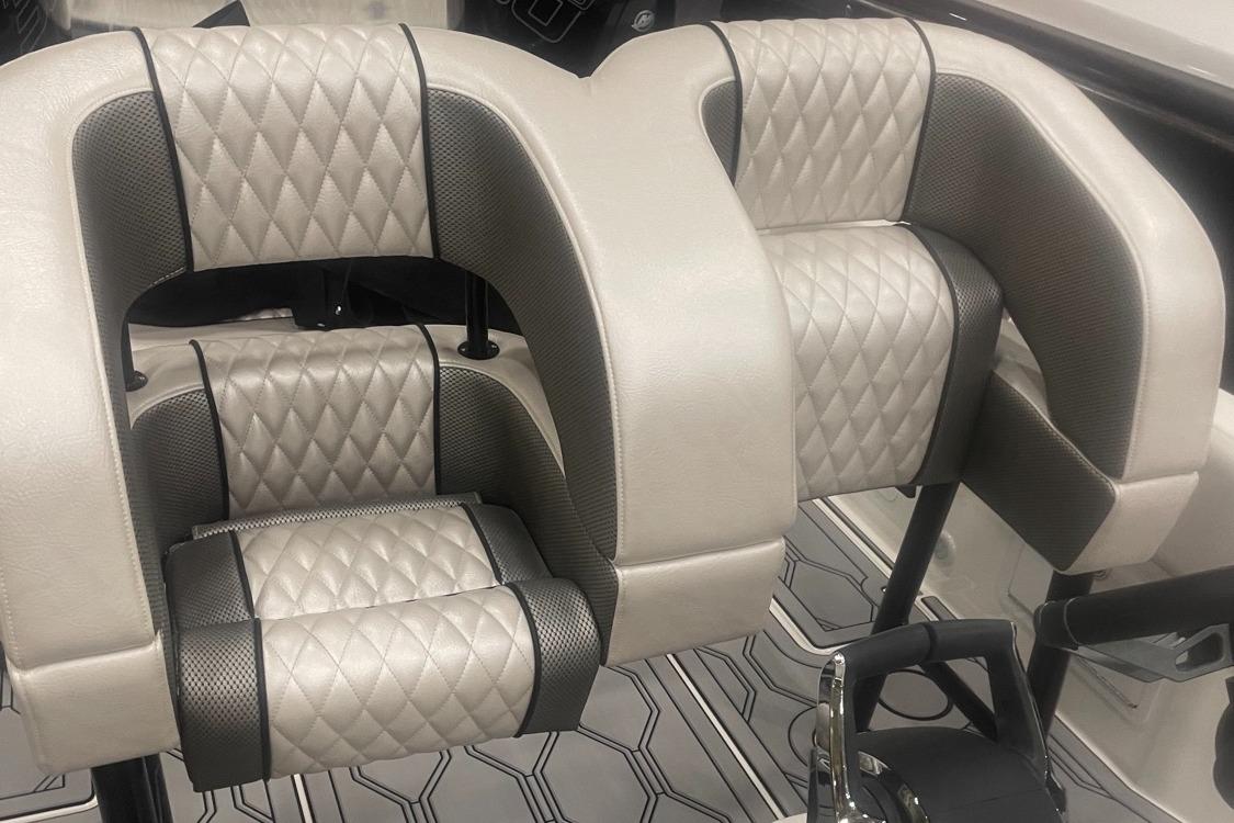 Luxury seating on the 2025 Hustler 25 C3 Speedfish boat with diamond-stitched upholstery.