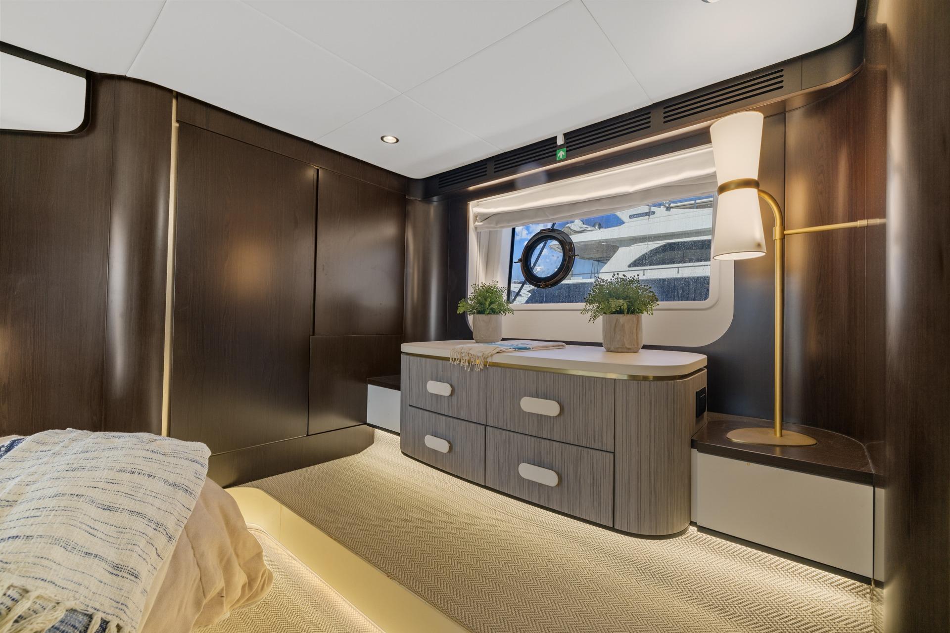 Luxurious interior of 2019 Azimut 55 yacht with elegant wood finishes and modern decor.