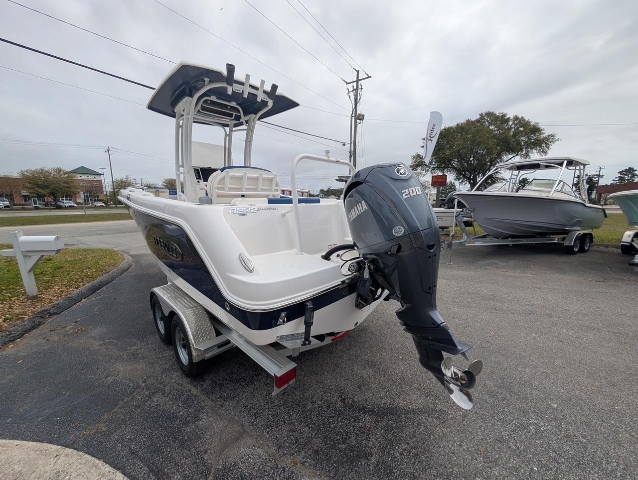 2025 Robalo R222 Explorer boat with Yamaha 200 engine on trailer.