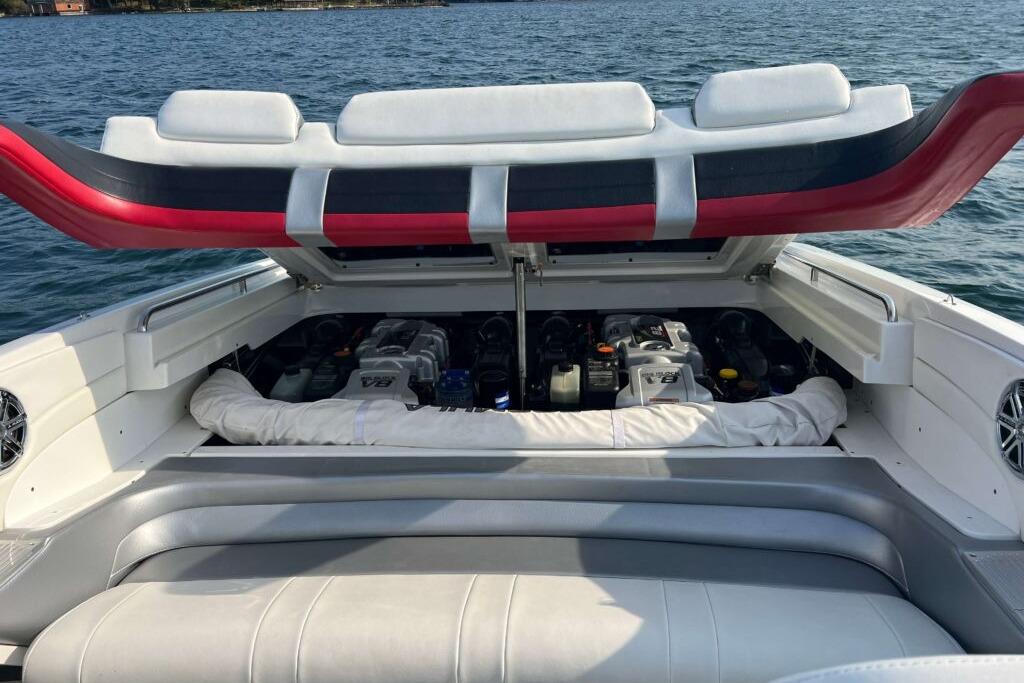 2016 Formula 353 FASTech boat engine compartment open on water.
