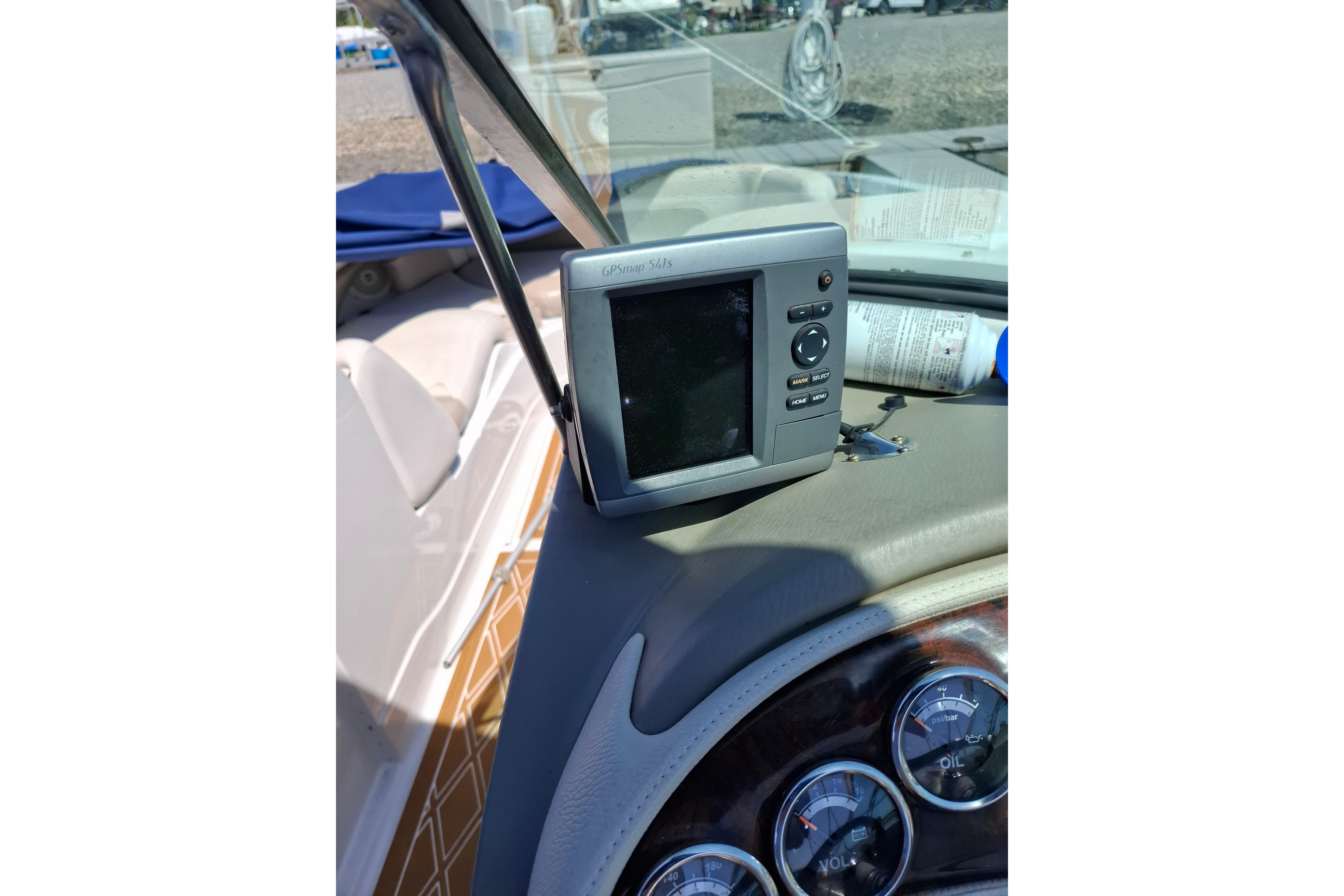 Dashboard of 2013 Crownline Eclipse E6 with GPS and gauges.