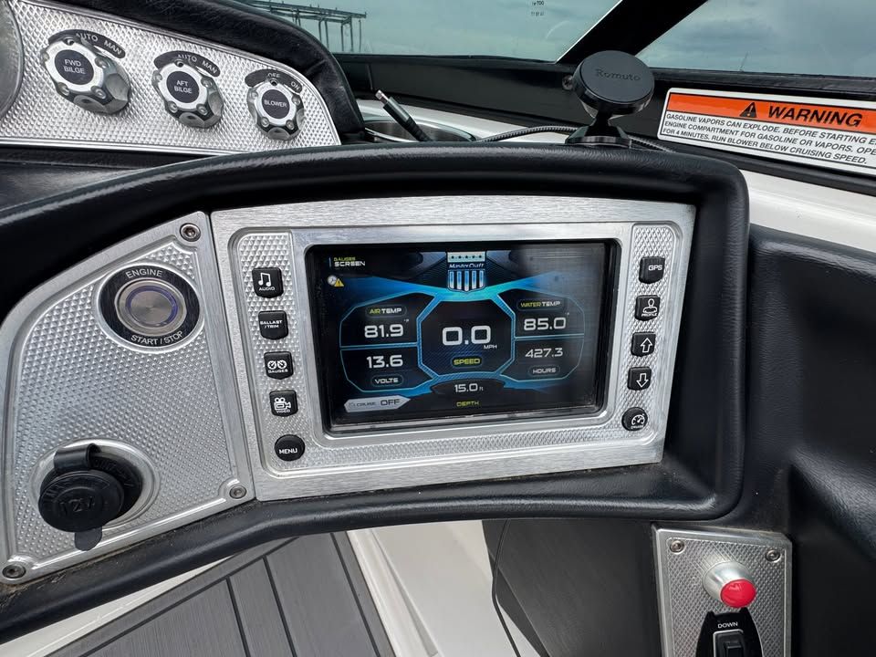 Dashboard of a 2015 MasterCraft X46 boat with digital display.
