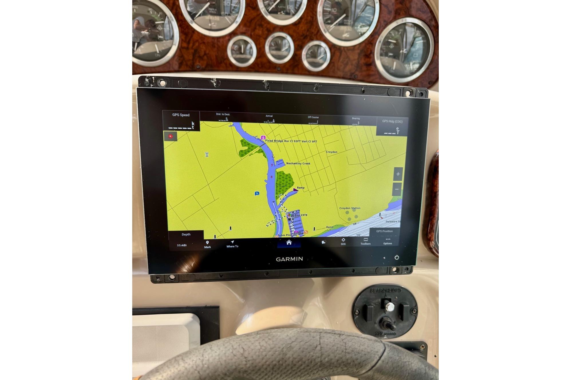 Garmin navigation display on 2003 Sea Ray 300 Sundancer boat dashboard.