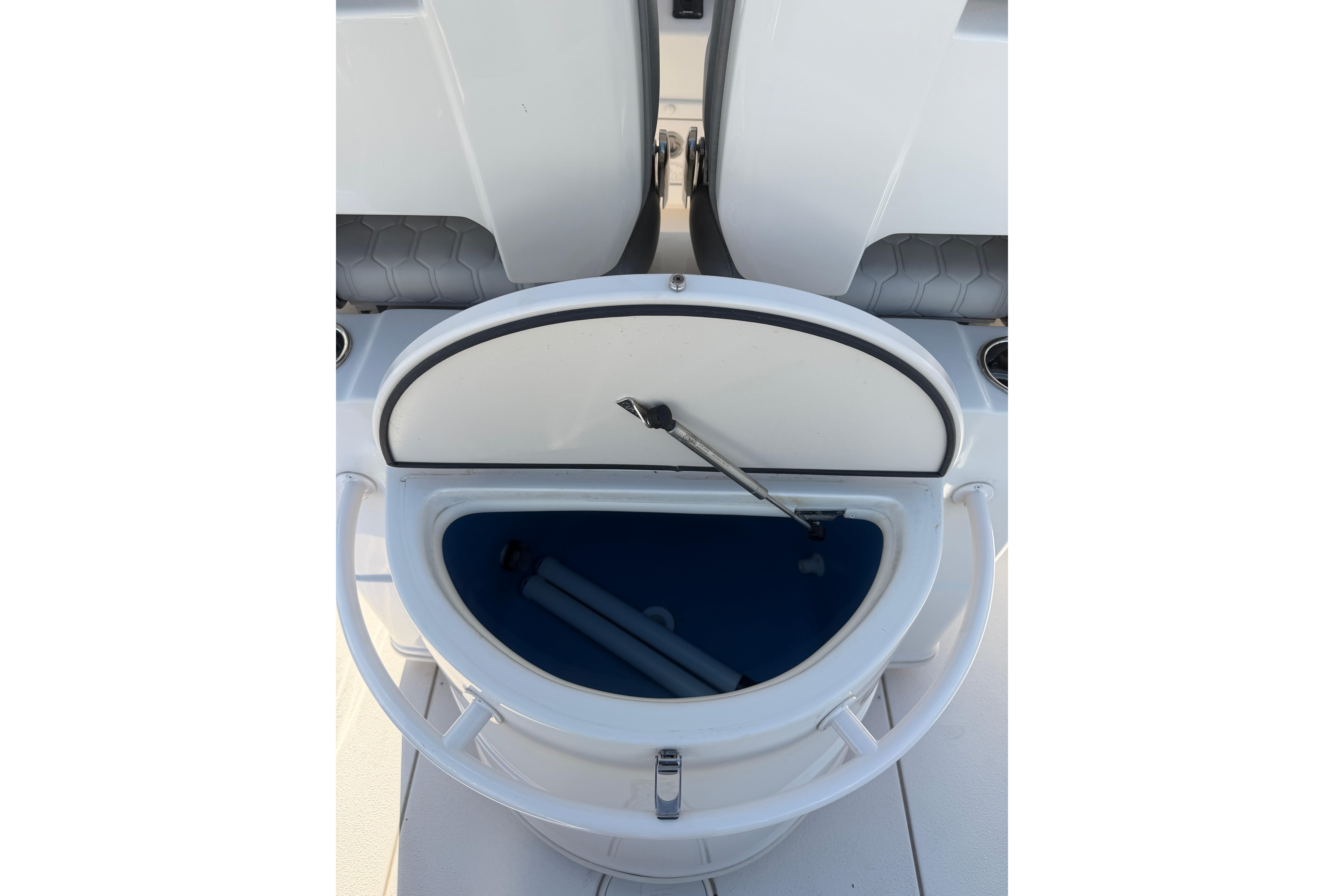 Open storage compartment on 2023 Sea Chaser 27 HFC CC boat.