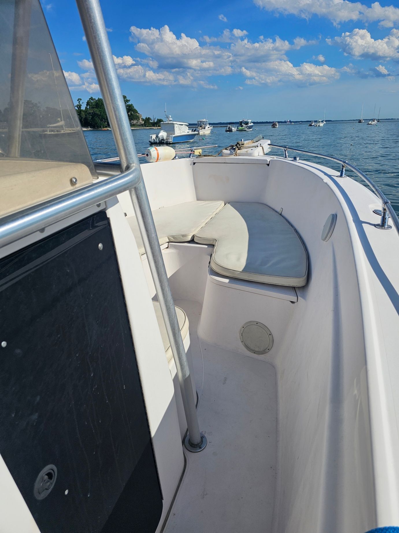 The image shows the deck of a 1997 Grady-White Chase 263 boat on the water.