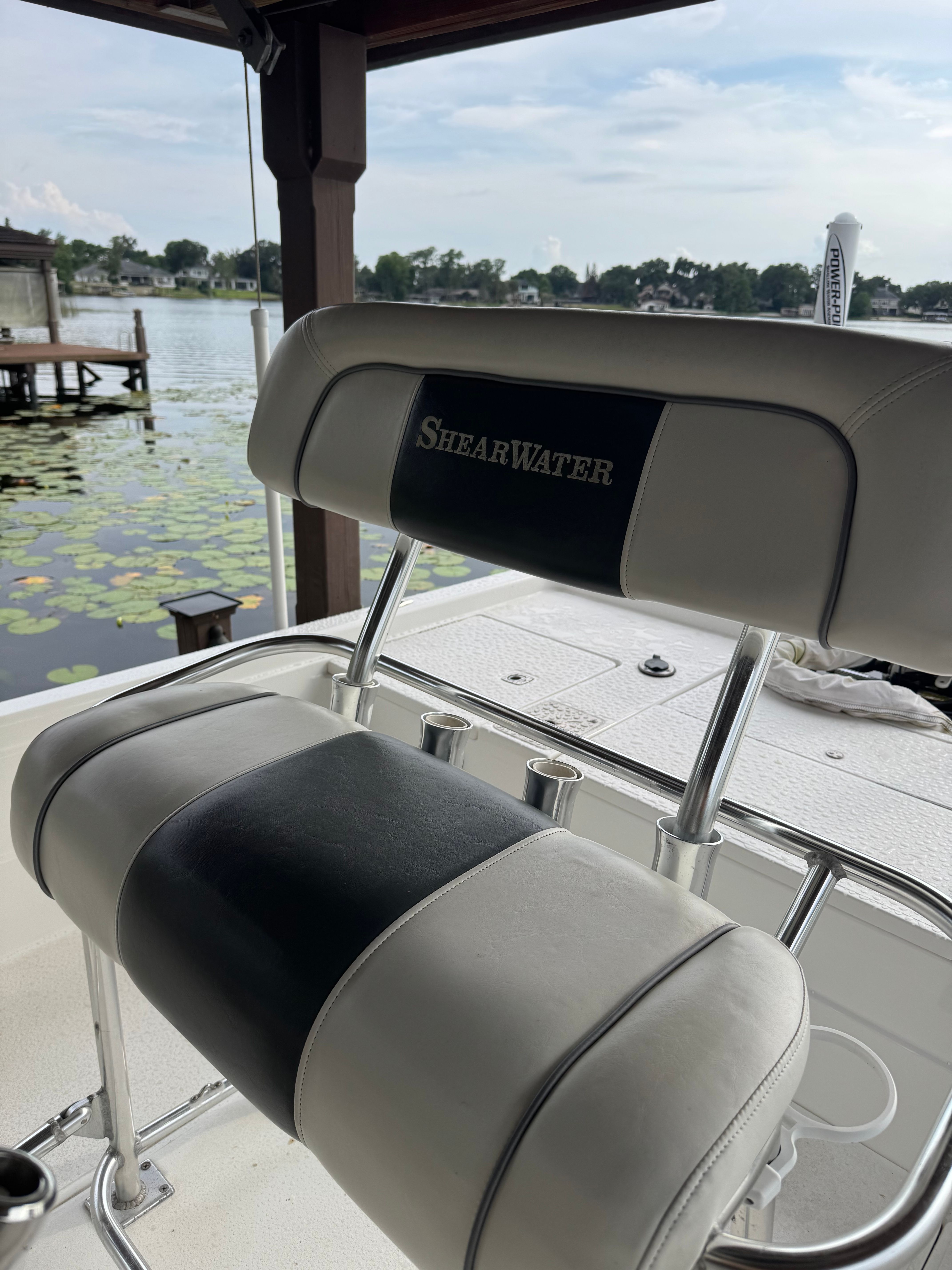 ShearWater LTZ 2004 boat seat by the lakeside.