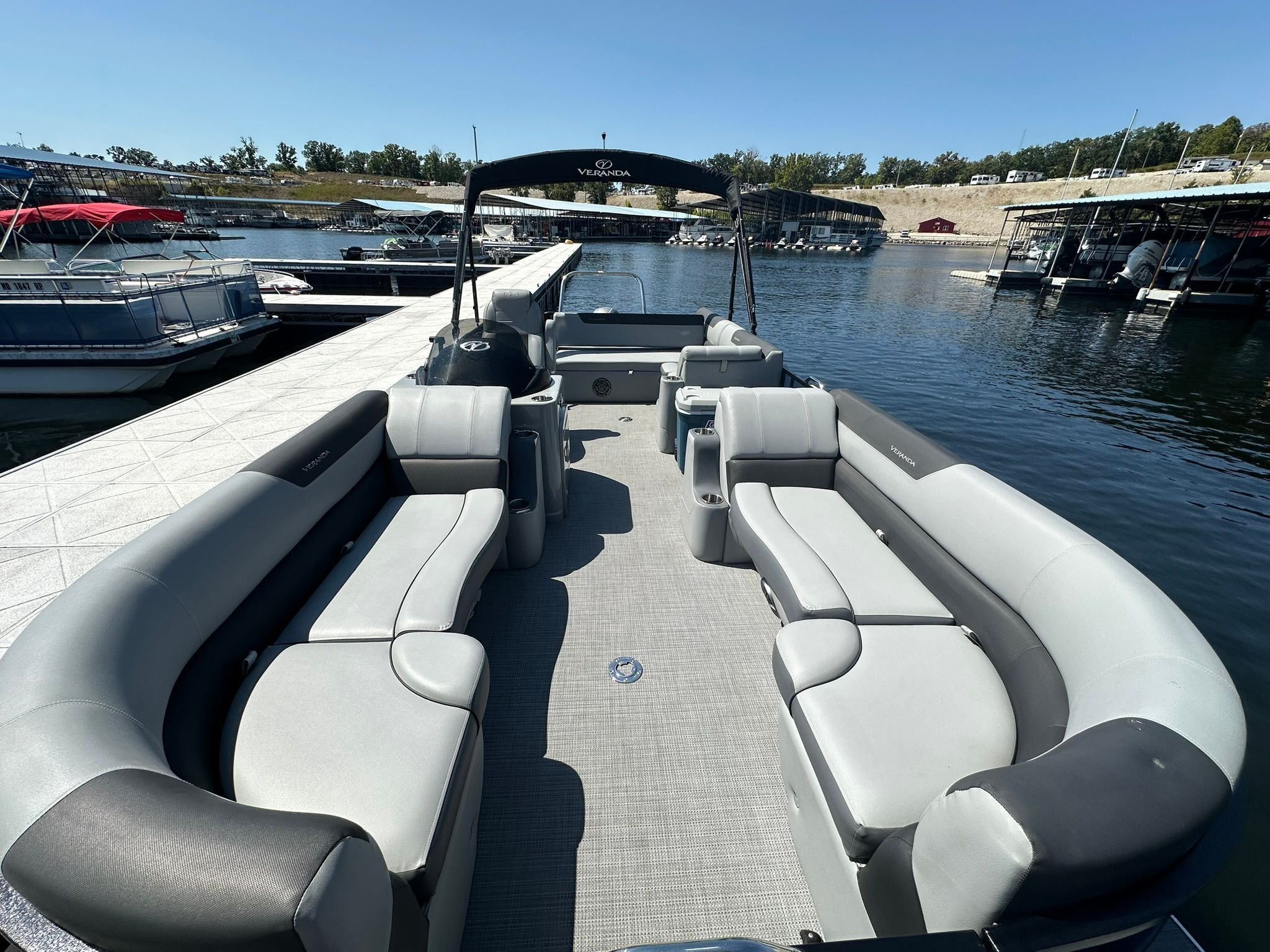 2023 Veranda Relax VR25VLB pontoon boat at dock.