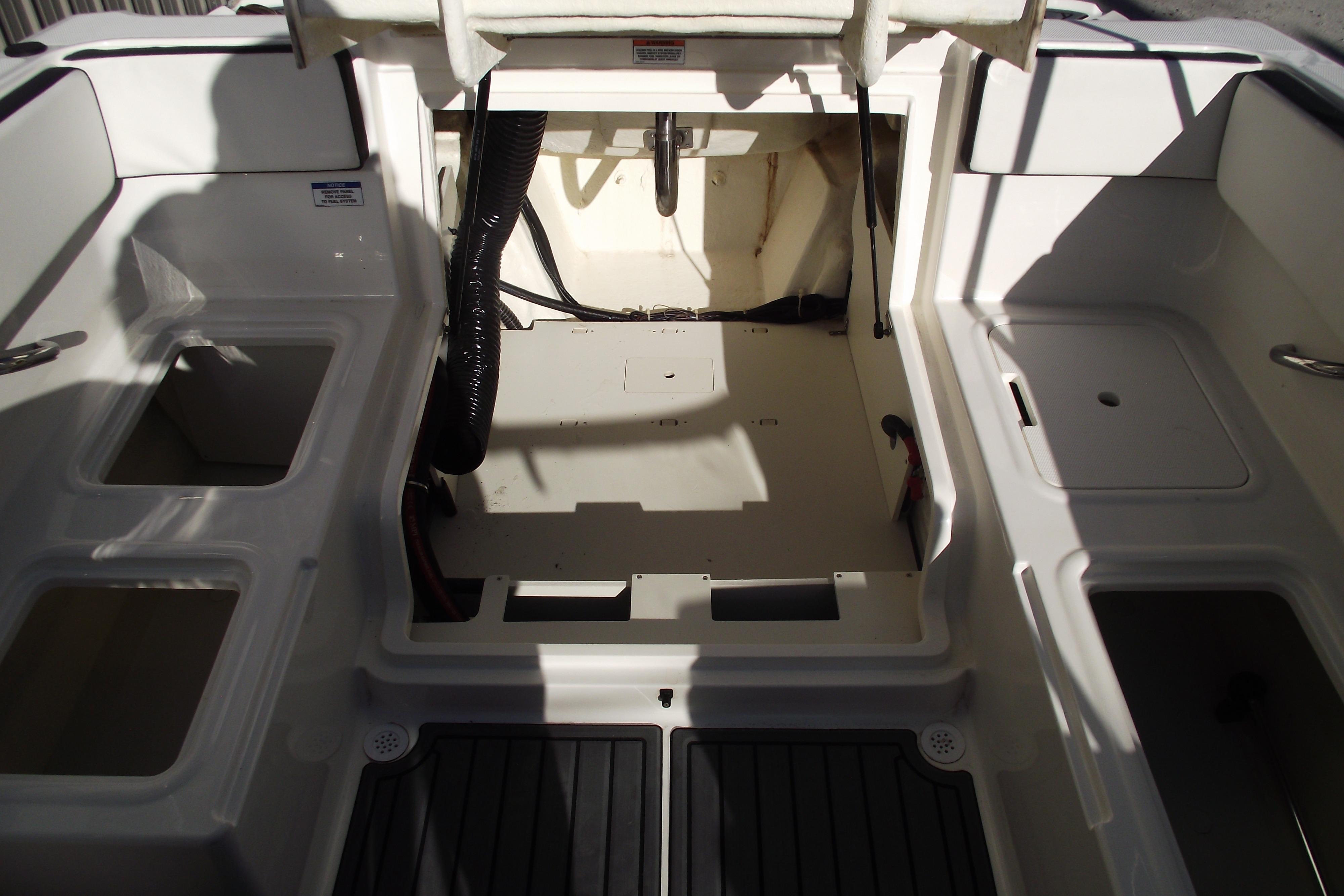 2022 Bayliner VR4 Bowrider OB interior, showcasing storage compartments and seating layout.