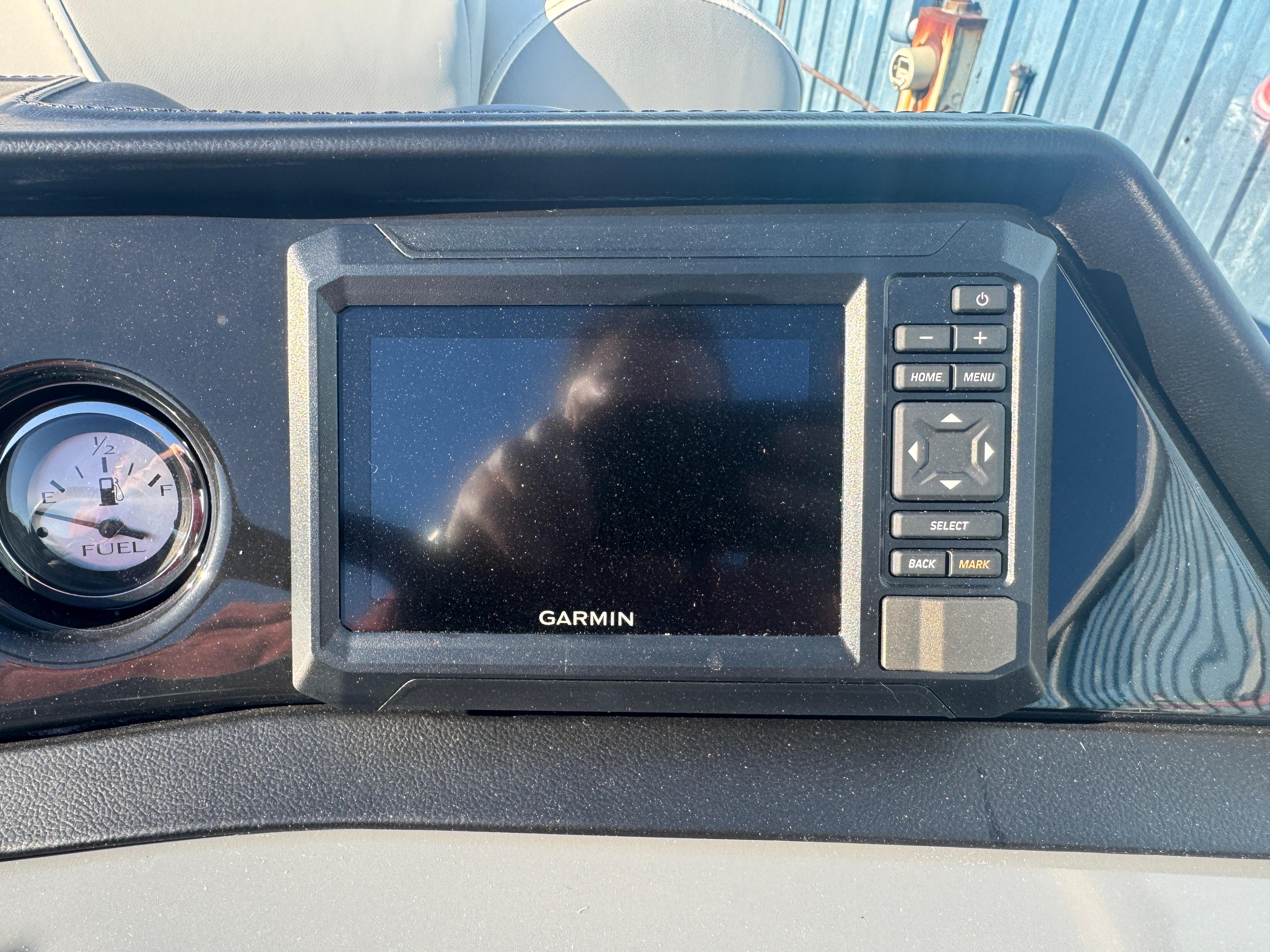 Garmin display and fuel gauge on 2025 Bennington 22 SSRSR boat dashboard.