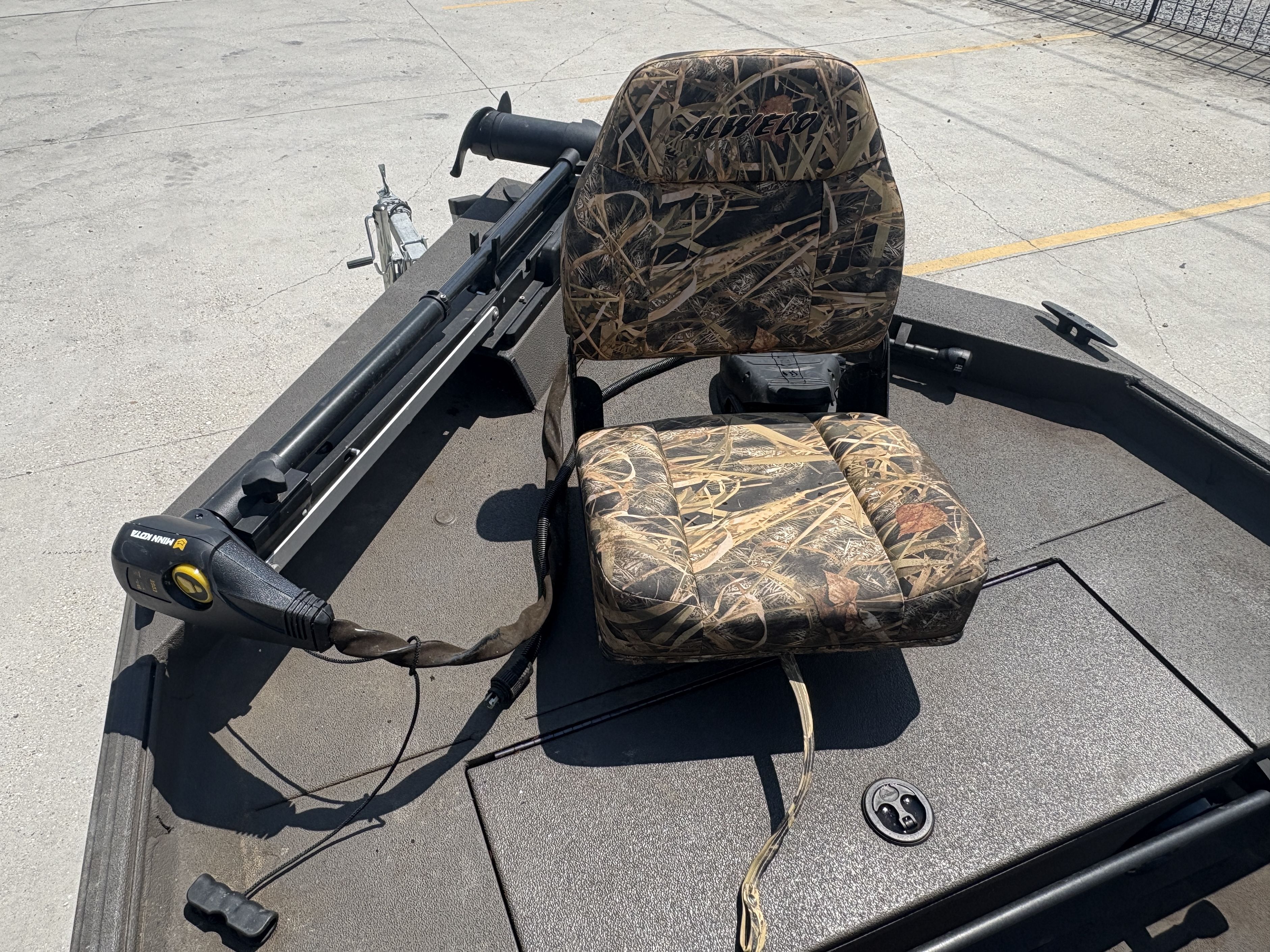 2023 Alweld 16x52 Marsh boat with camo seat and trolling motor.