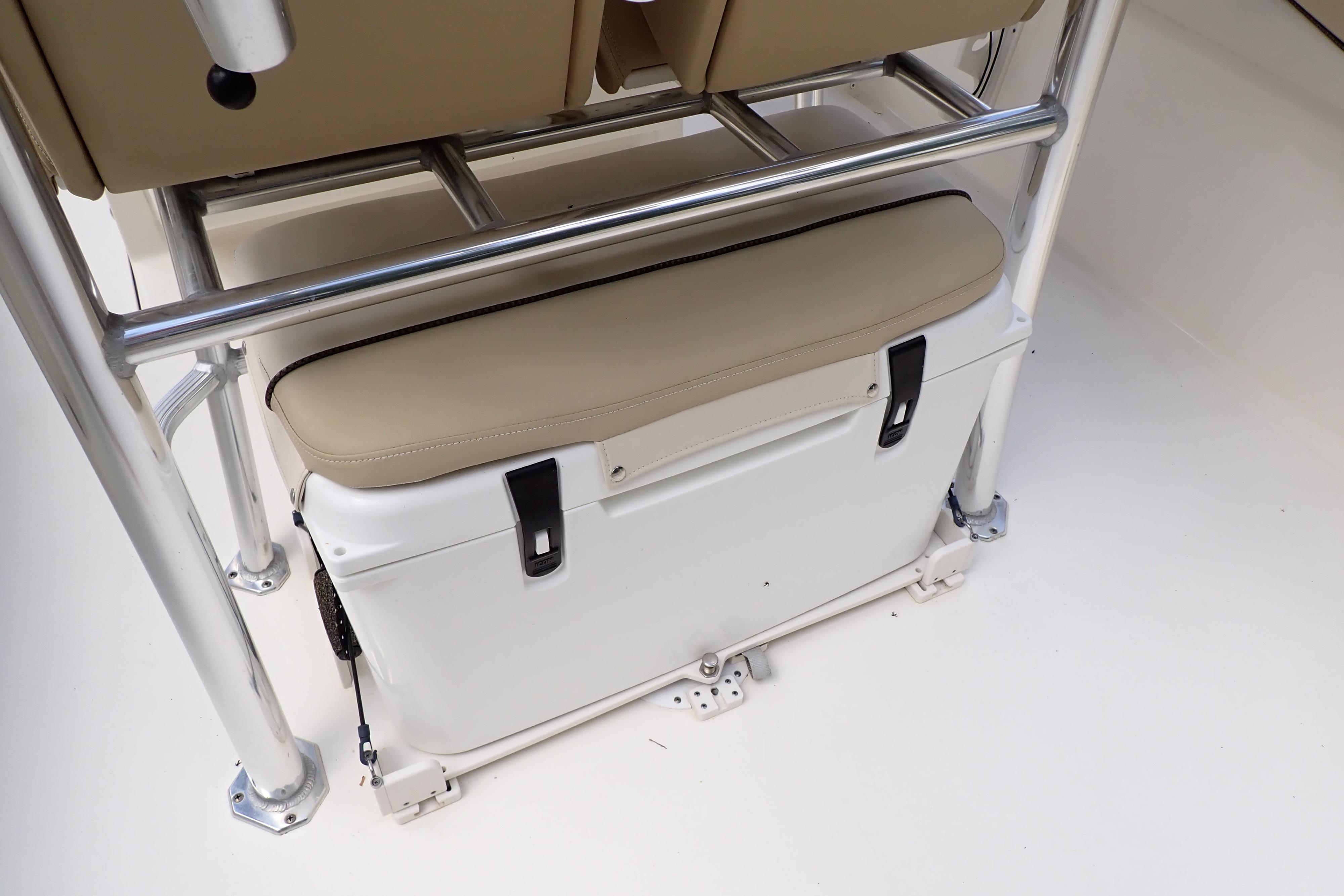 2019 Key West 263 FS boat cooler storage under seat with metal frame.