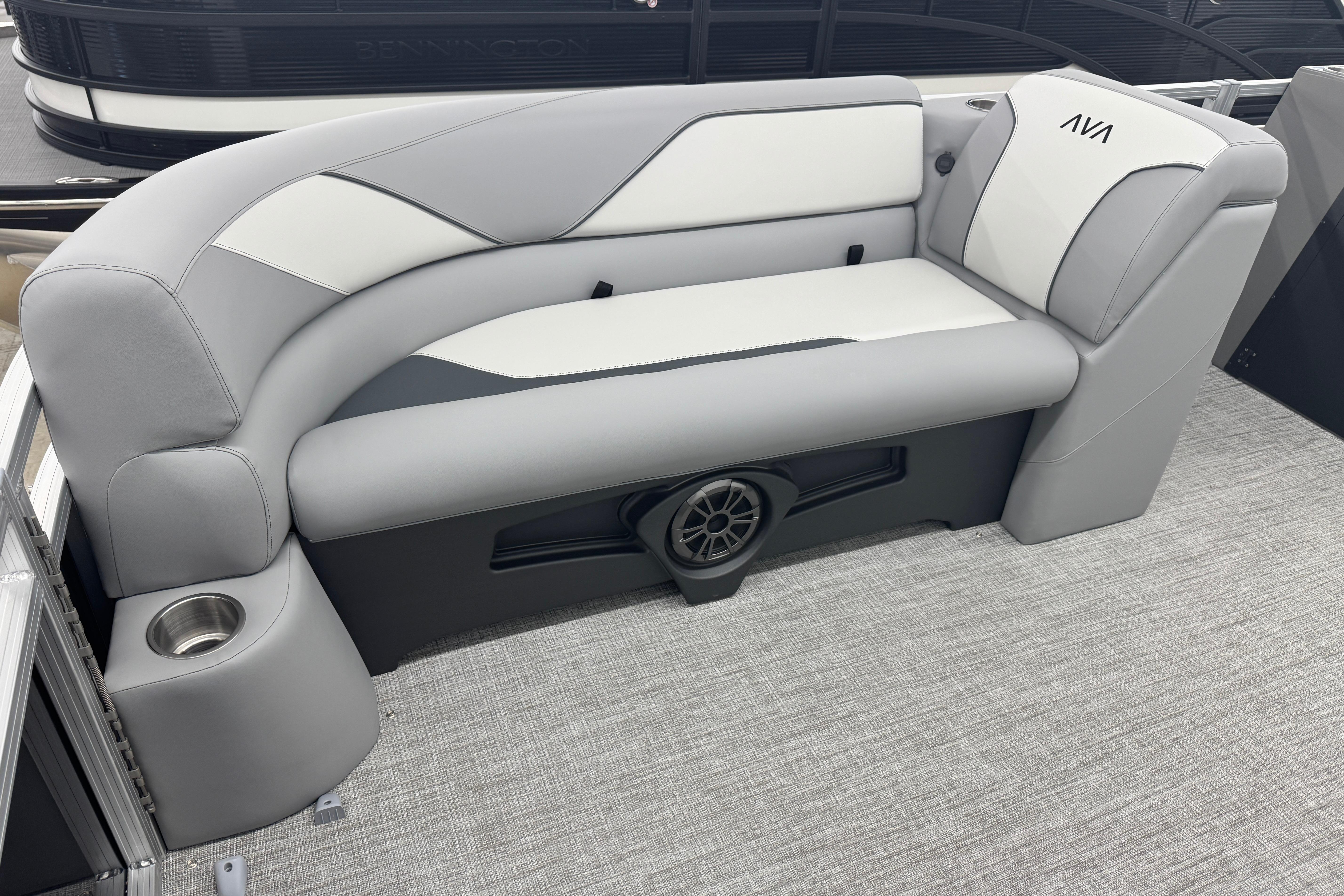 Luxurious seating on 2026 Avalon Ventue 85 RF pontoon boat, featuring sleek gray and white upholstery.