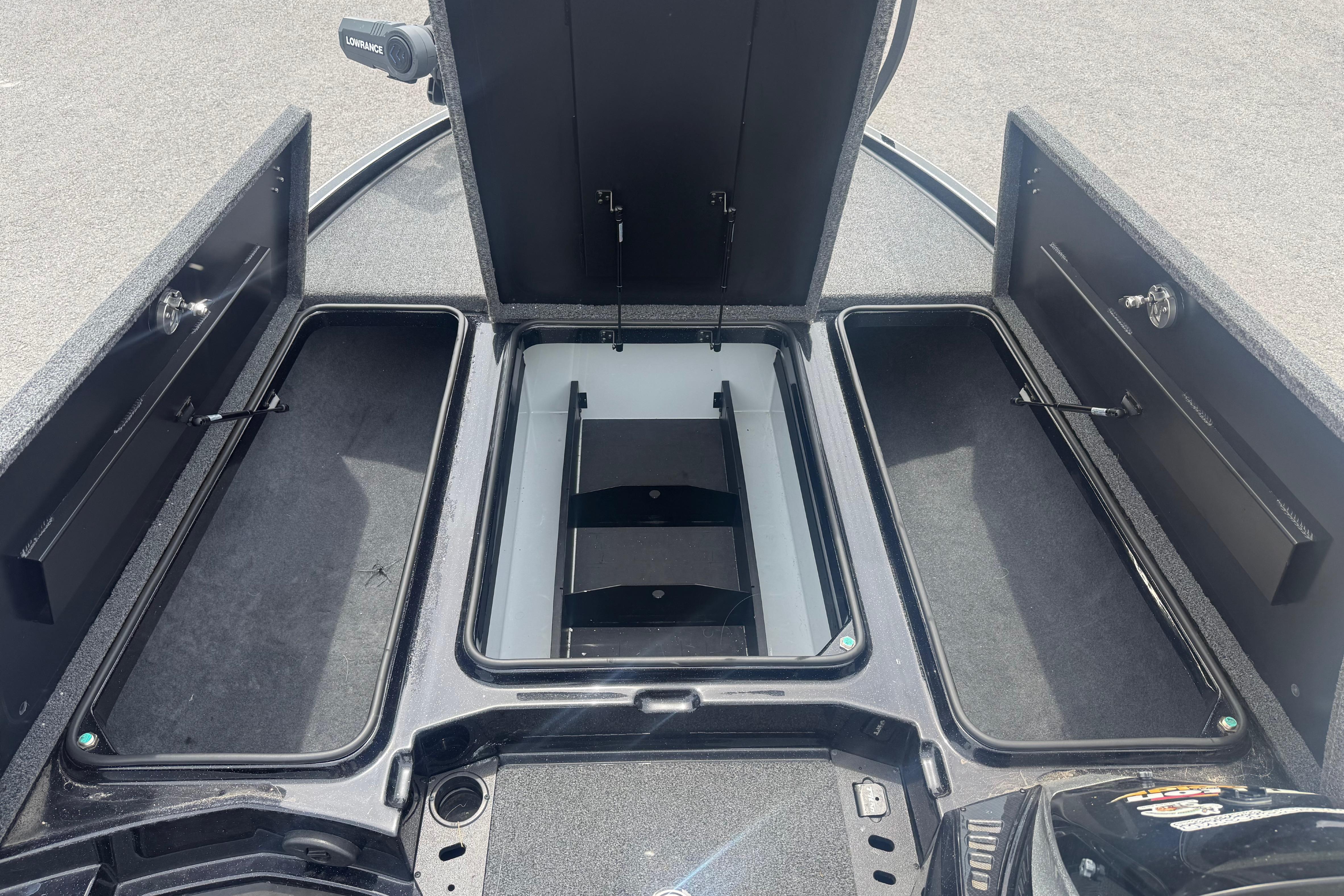 2024 Triton 20XP boat storage compartments with open lids, showcasing spacious interior design.