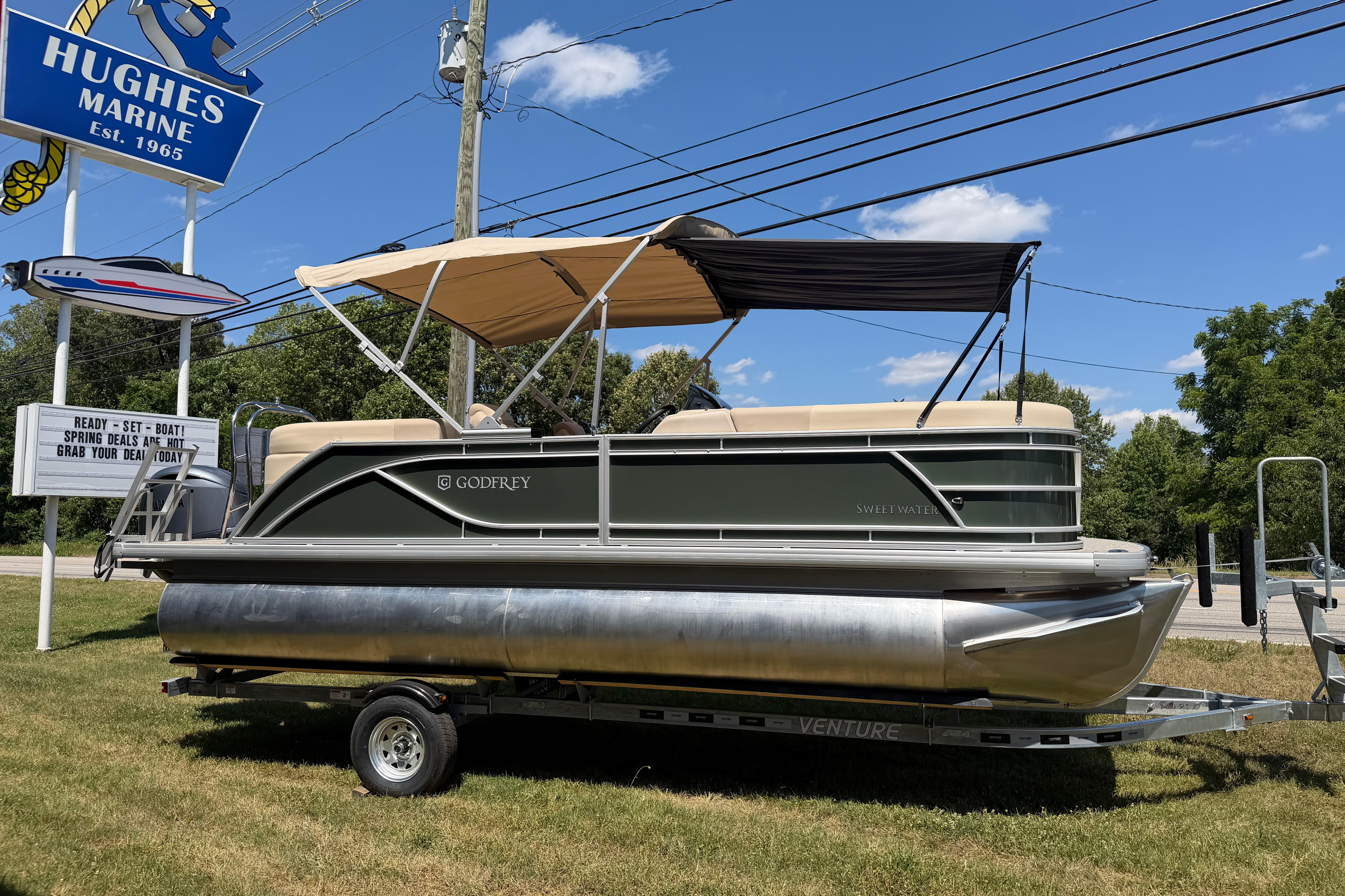 2026 Godfrey SW 2086 SBC pontoon boat displayed at Hughes Marine dealership.