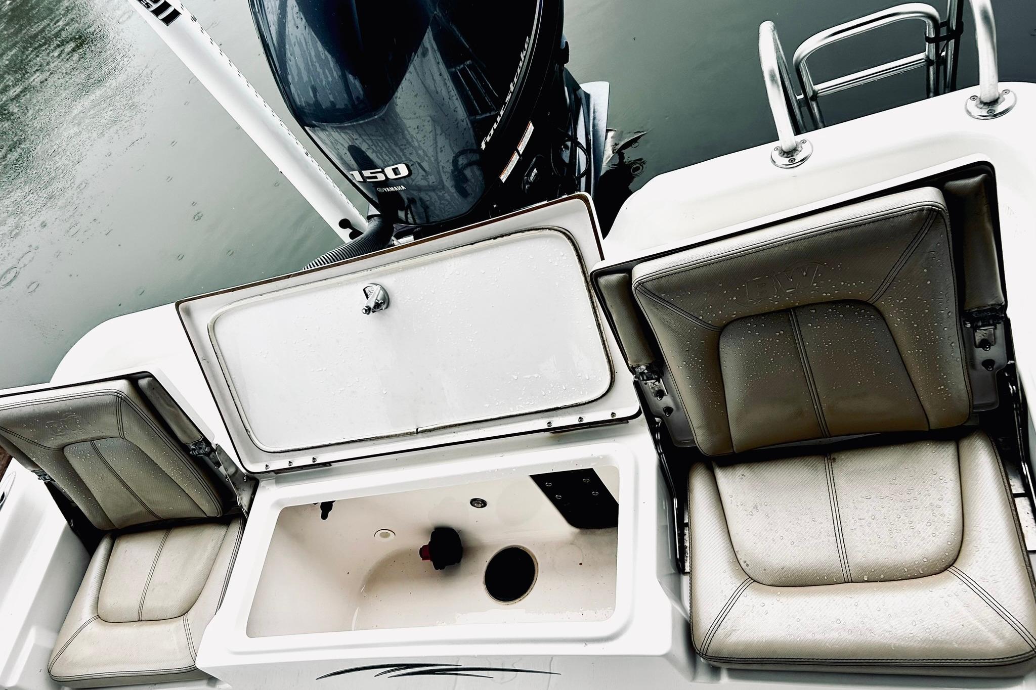 2017 Blue Wave 2200 PureBay boat interior with seating and storage compartments.