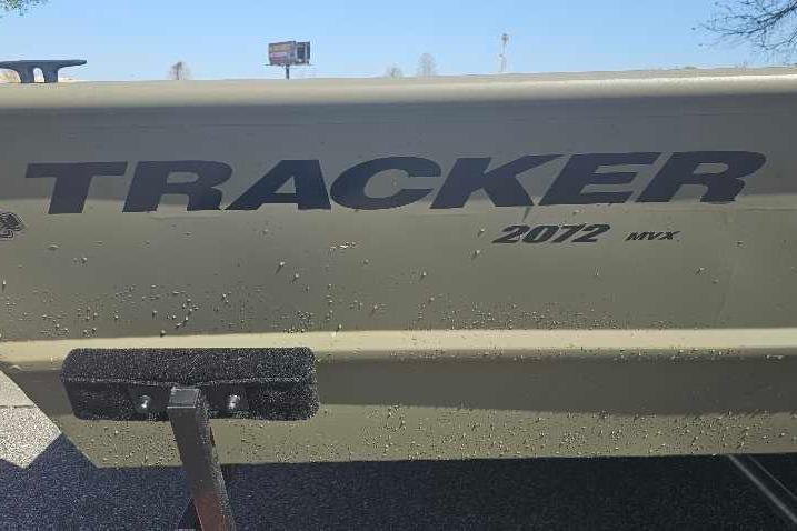 2025 Tracker Grizzly 2072 Utility boat side view with logo and model details.