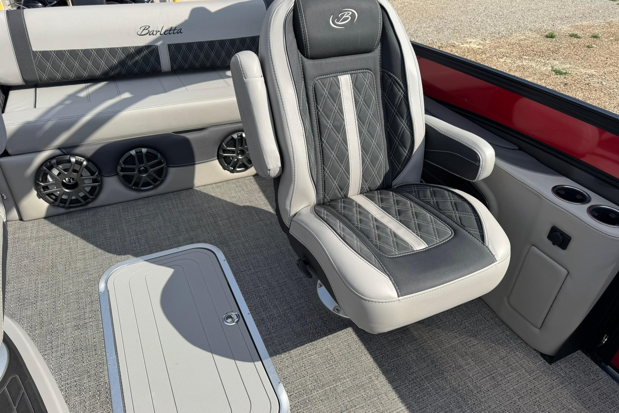 Luxurious interior of 2025 Barletta LUSSO 25UCAT with premium seating and sound system.
