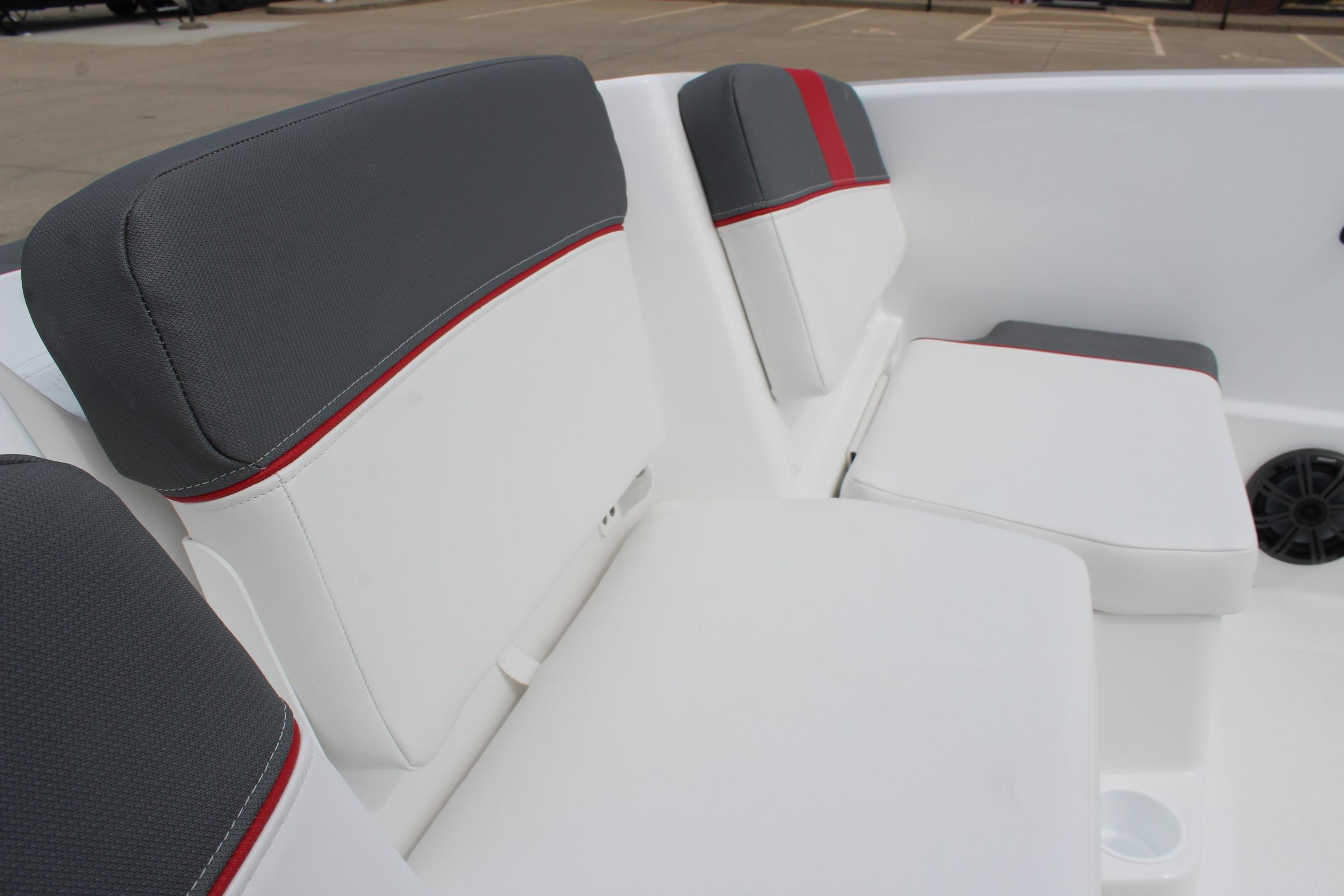 2026 Tahoe T16 boat interior with gray and white seating, red accents.