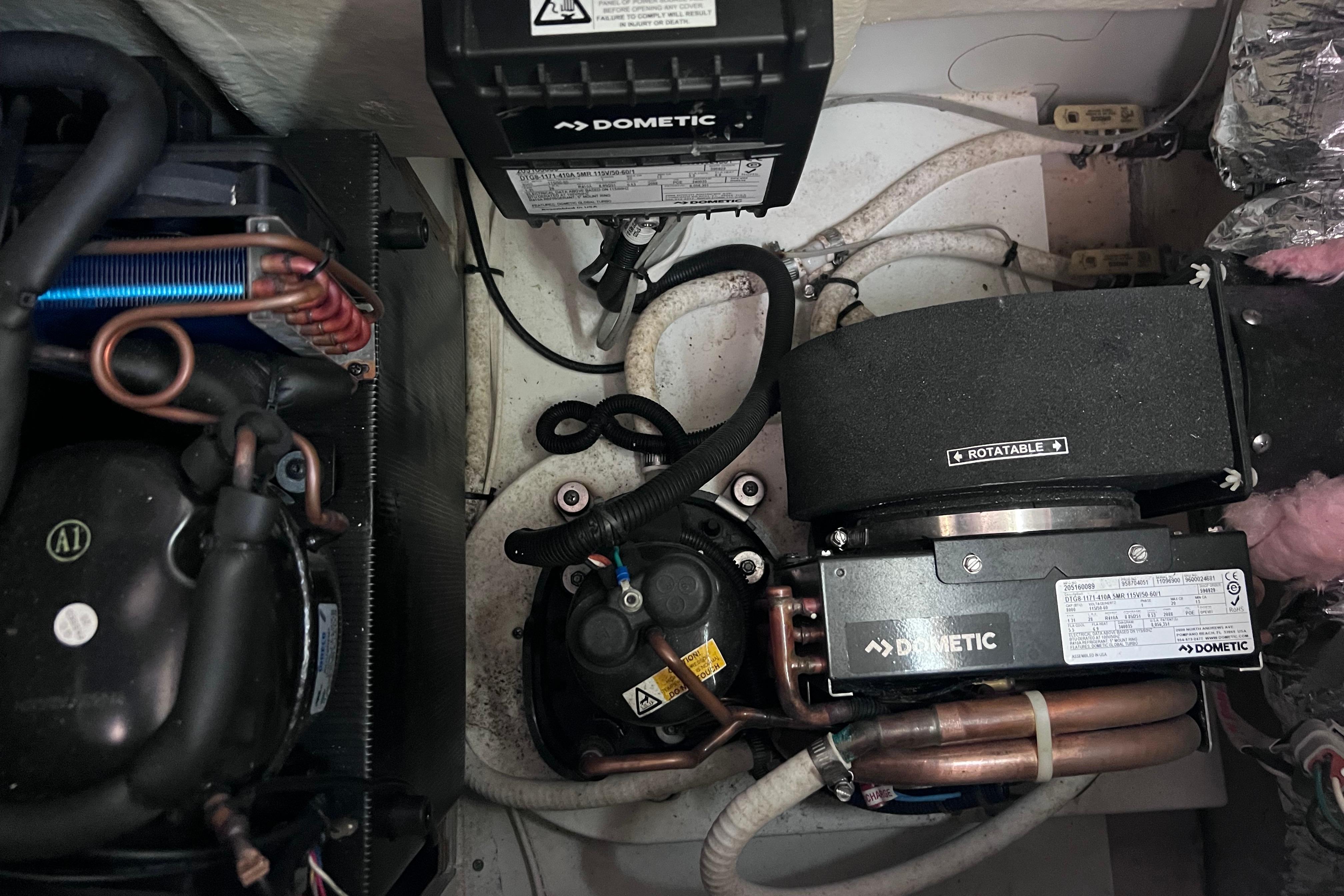 Engine compartment of 2021 Jeanneau NC Weekender 795 Series 2 with Dometic components.