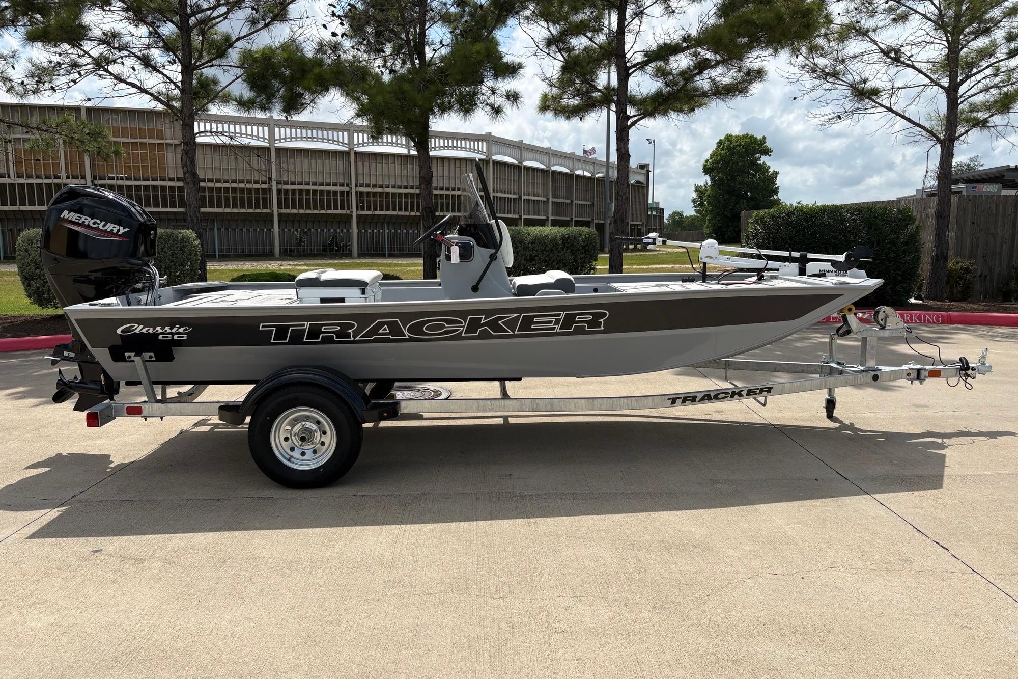 2026 Tracker Bass Tracker Classic CC boat on trailer, parked outdoors.