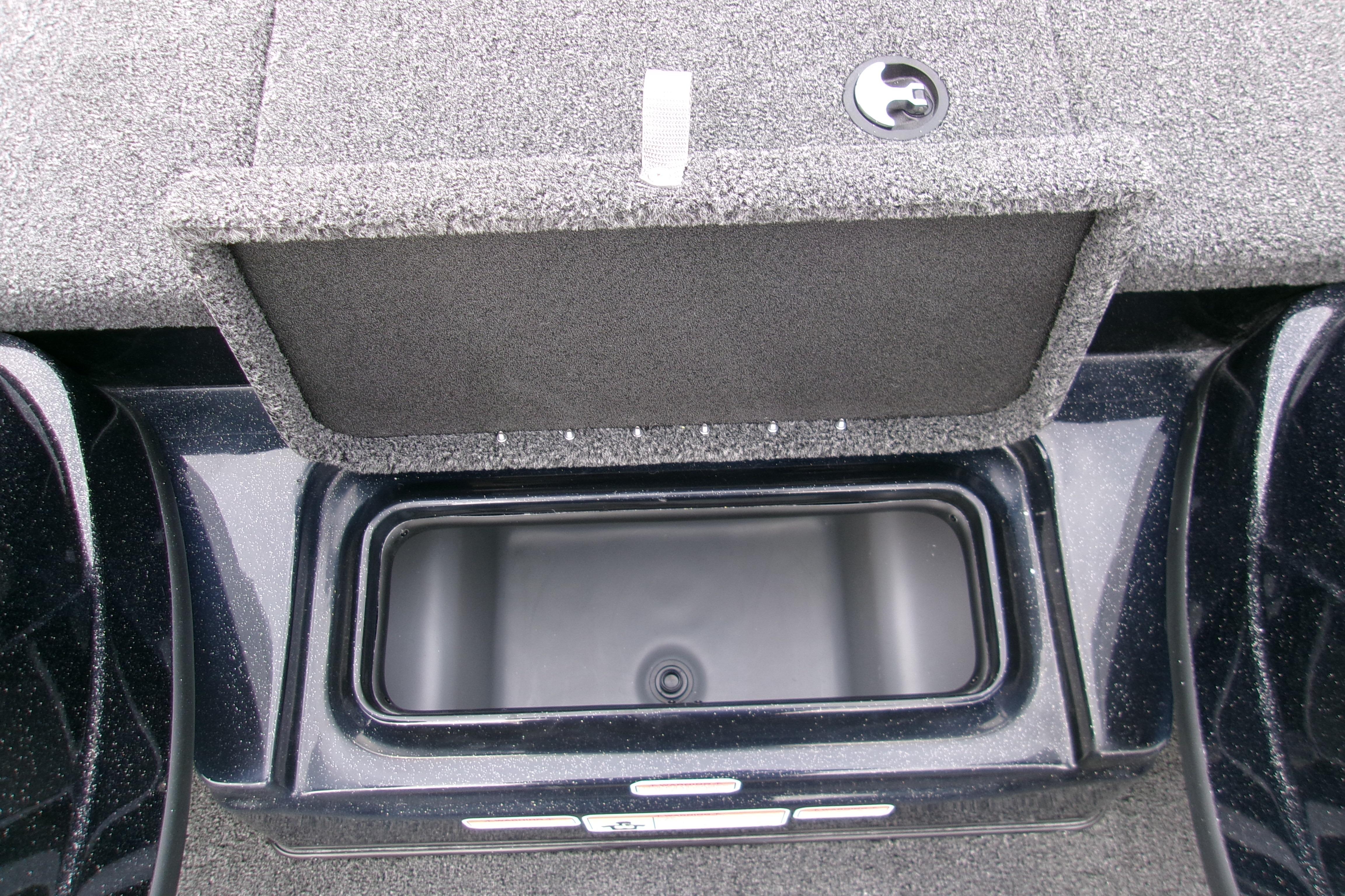 2026 Nitro Z17 boat storage compartment with open lid, showcasing interior space.
