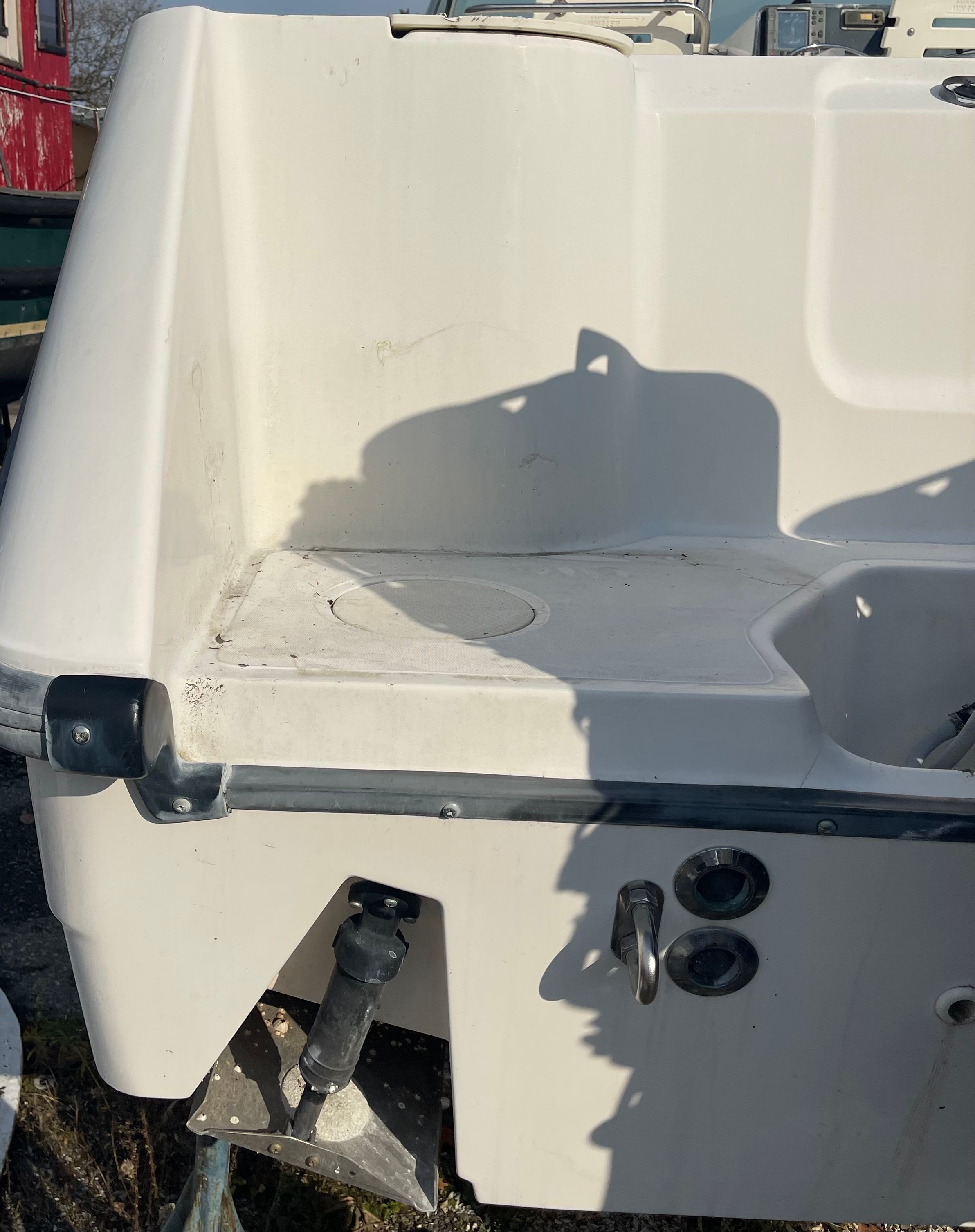 Rear view of a 2001 Boston Whaler 26 Conquest boat.