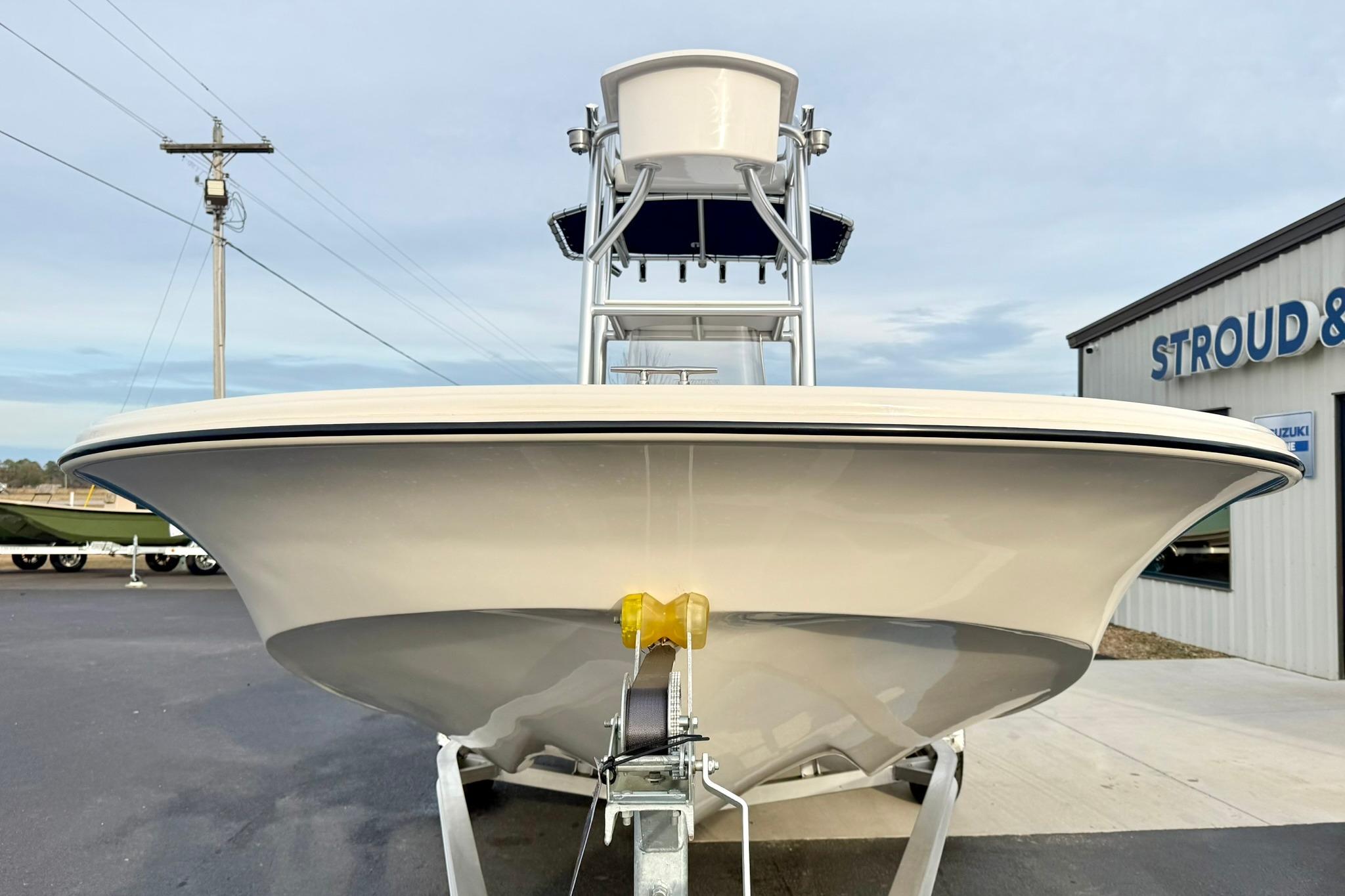 2025 Carolina Skiff 21 LS boat on trailer, front view at dealership.
