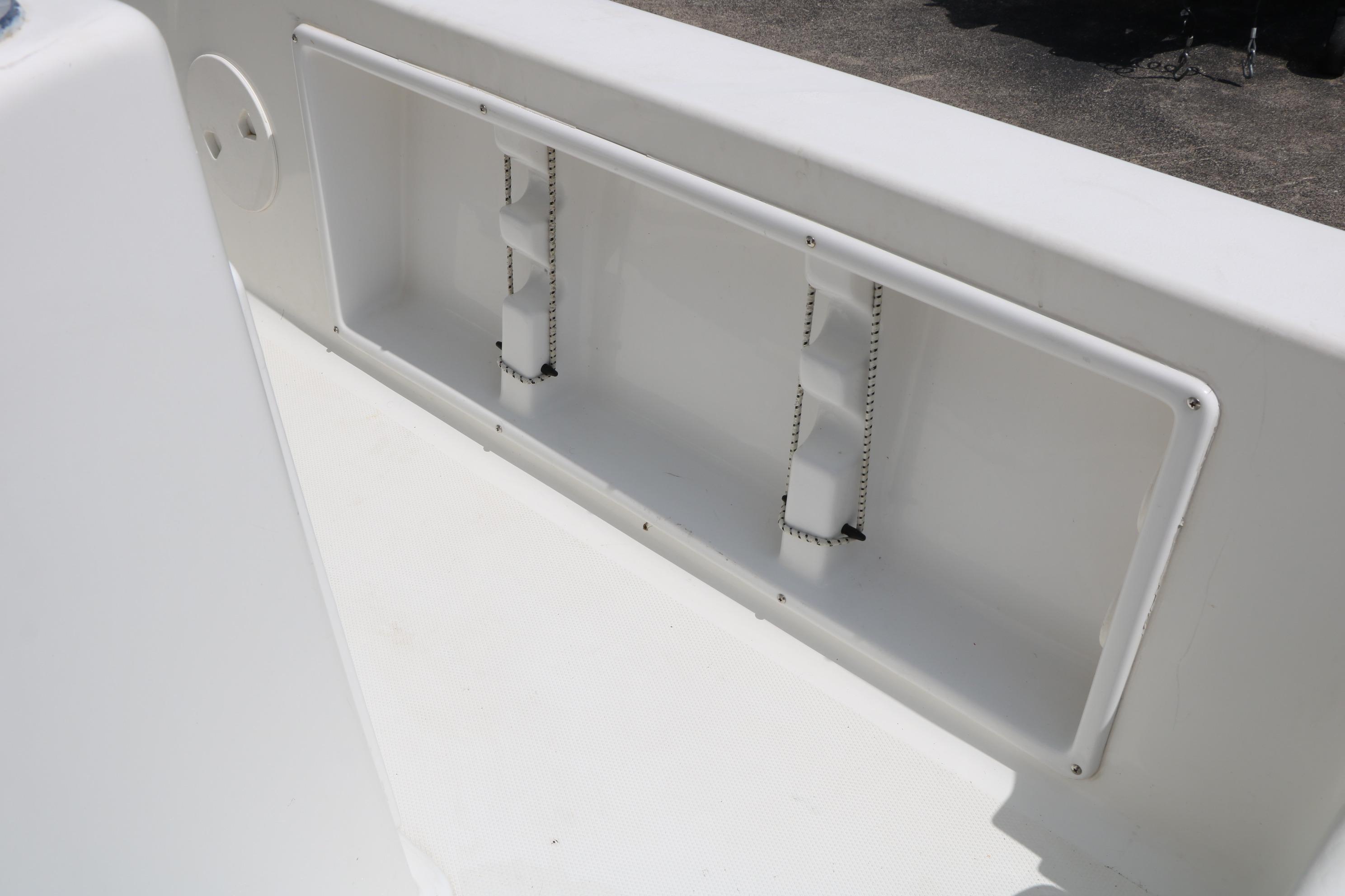 2015 Sea Hunt BX 22 BR boat interior storage compartment detail.
