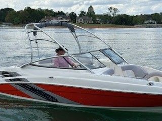2008 Yamaha AR230 boat on a calm lake.