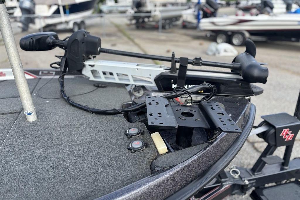 2020 Bass Cat Cougar FTD boat deck with trolling motor and mounting brackets.